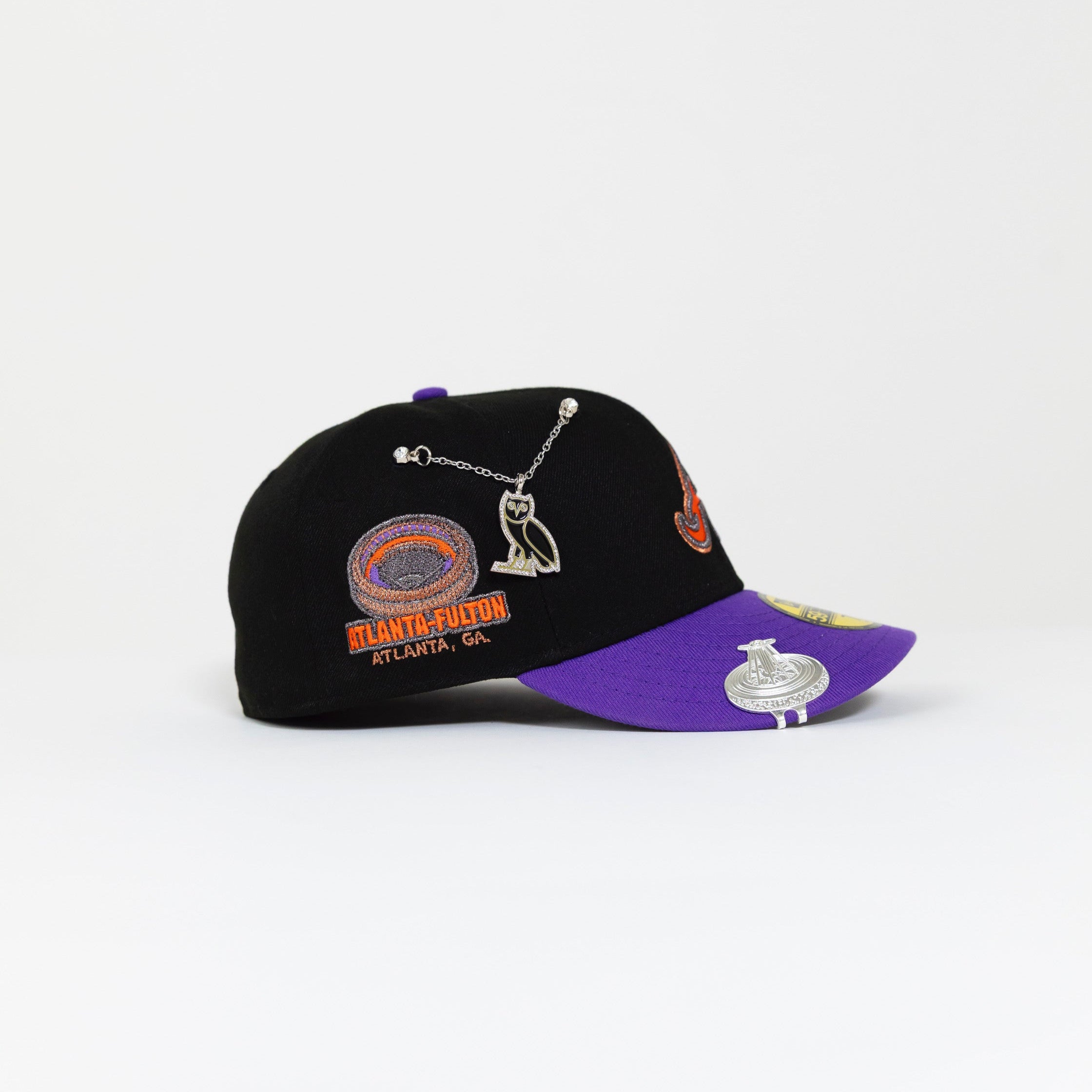 NEW ERA 59FIFTY BLACK/ PURPLE ATLANTA BRAVES W/ "ATLANTA-FULTON" SIDE PATCH