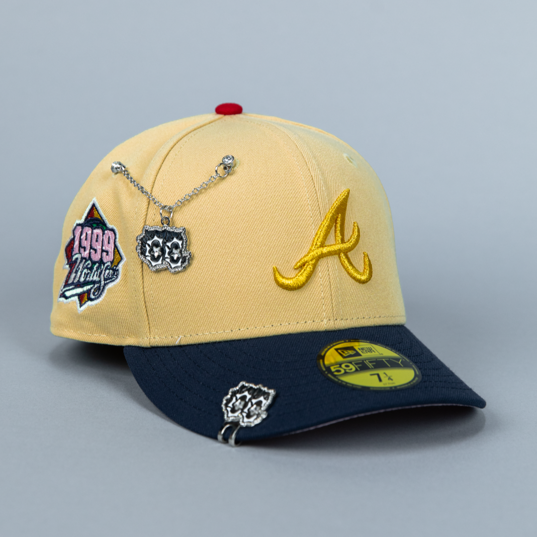 NEW ERA 59FIFTY VEGAS GOLD/ NAVY ATLANTA BRAVES W/ 1999 WORLD SERIES SIDE PATCH