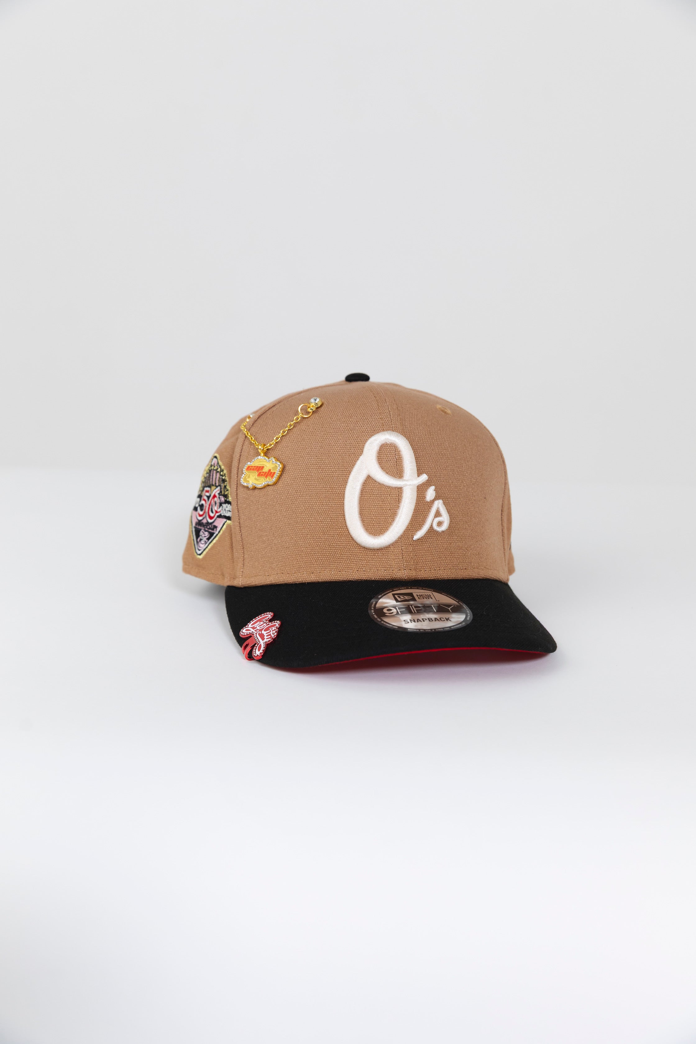 NEW ERA EXCLUSIVE 9FIFTY TAN/ BLACK BALTIMORE ORIOLES SNAPBACK W/ 50TH ANNIVERSARY PATCH