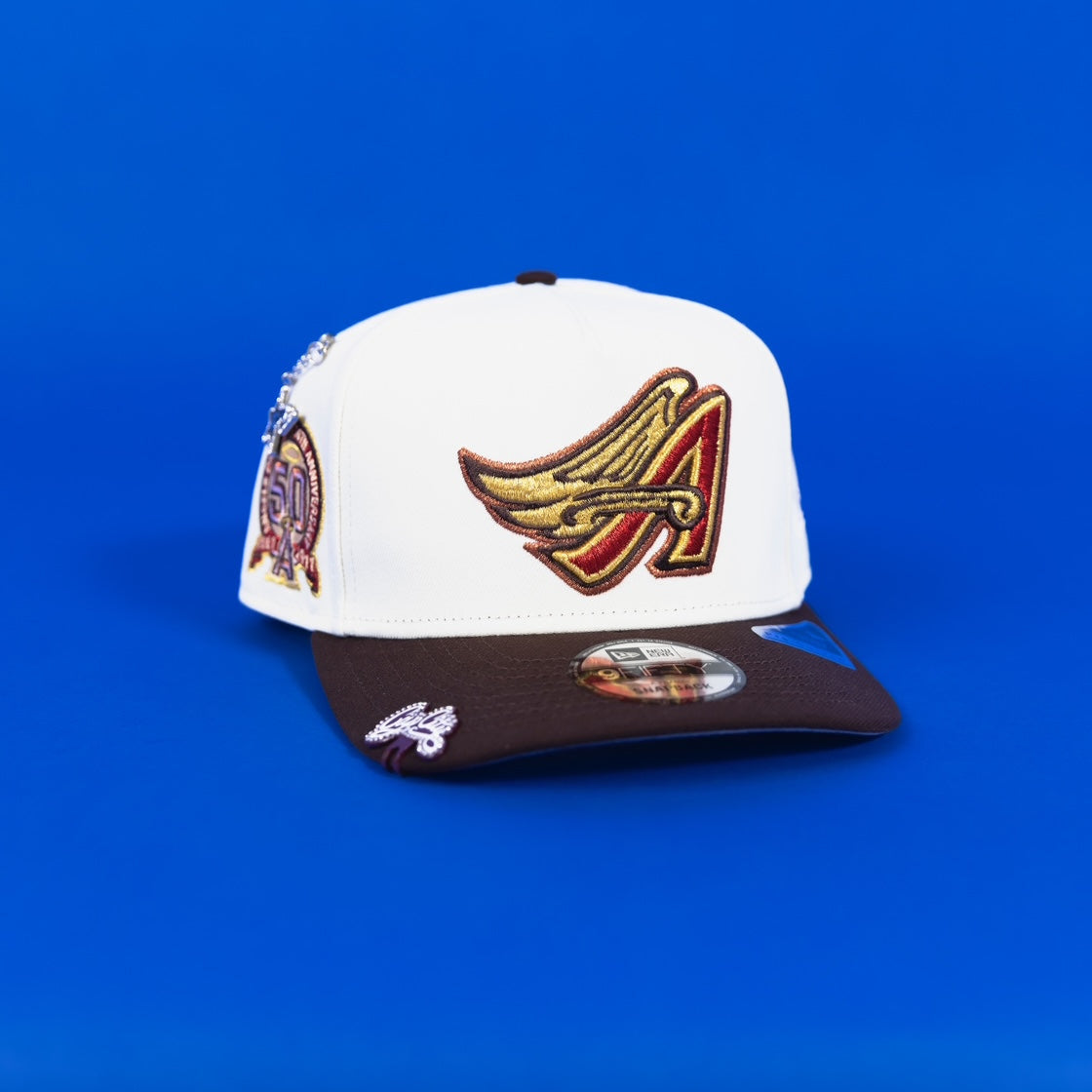 NEW ERA 9FIFTY A-FRAME CHROME/ BROWN ANAHEIM ANGELS SNAPBACK W/ 50TH ANNIVERSARY SIDE PATCH