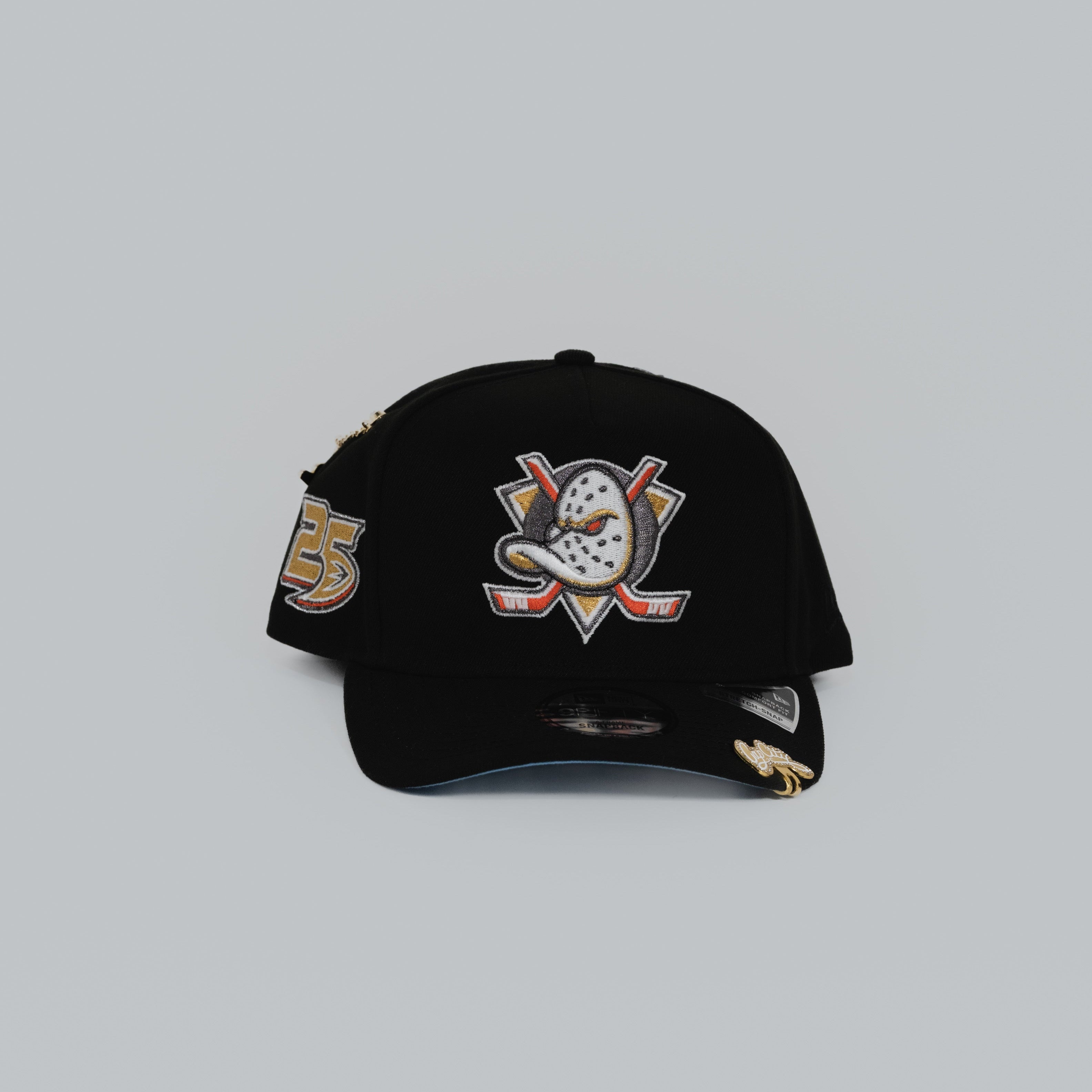 NEW ERA EXCLUSIVE 9FIFTY A-FRAME BLACK ANAHEIM DUCKS SNAPBACK W/ 25TH AMMIVERSARY SIDE PATCH