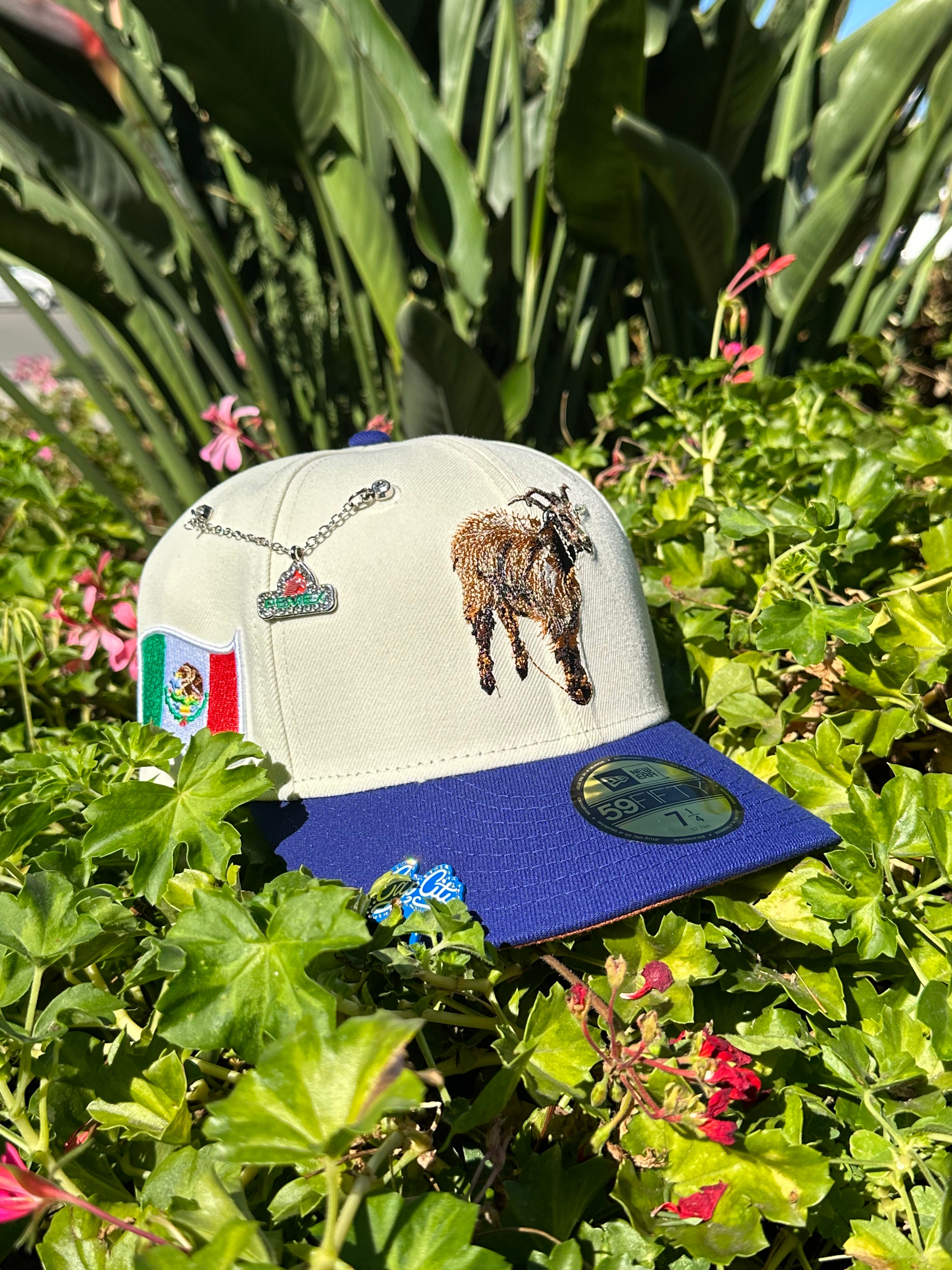 NEW ERA EXCLUSIVE 59FIFTY CHROME WHITE/BLUE "THE GOAT" W/ MEXICO FLAG SIDE PATCH