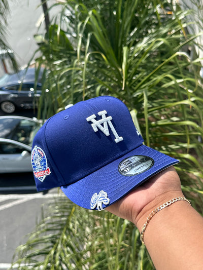 NEW ERA EXCLUSIVE 9FIFTY BLUE/SATIN UPSIDE DOWN LOS ANGELES DODGERS SNAPBACK W/ 60TH ANNIVERSARY PATCH (GREY UV)