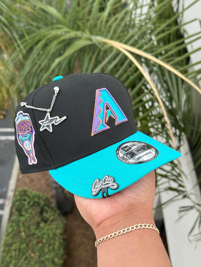 NEW ERA EXCLUSIVE 9FIFTY BLACK/TEAL ARIZONA DIAMONDBACKS TWO TONE SNAPBACK W/ 1998 INAUGURAL SEASON PATCH (PURPLE UV)