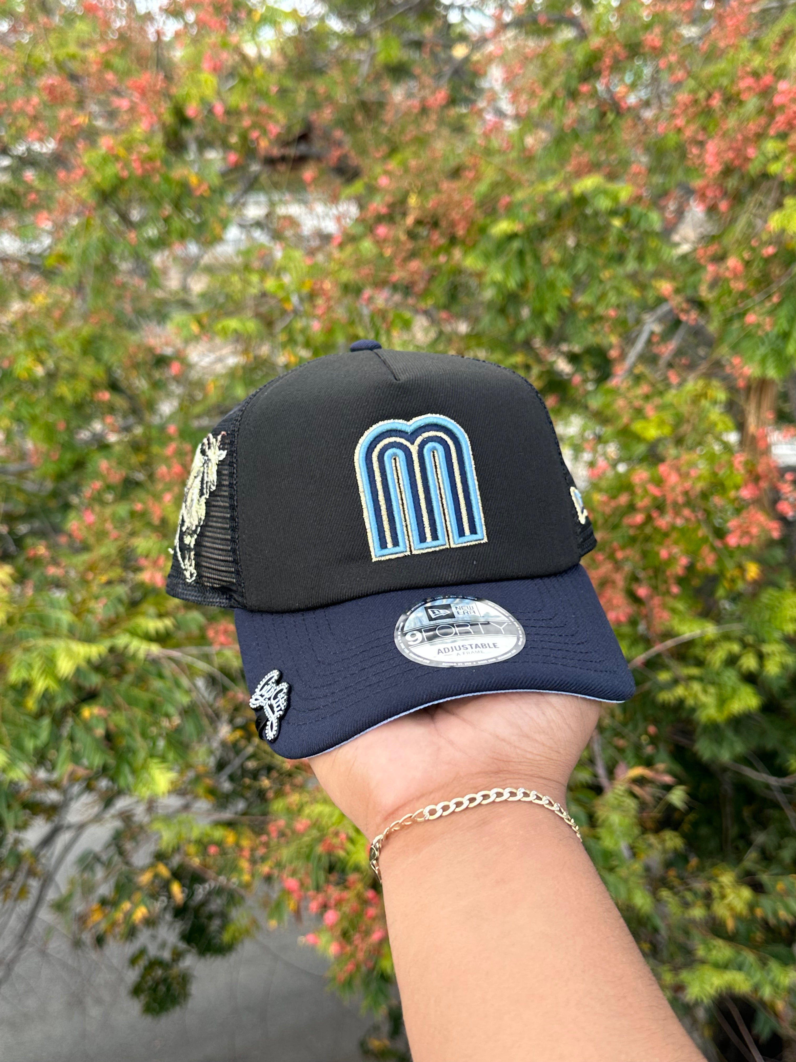 NEW ERA EXCLUSIVE 9FIFTY NEW ERA EXCLUSIVE 9FORTY BLACK/NAVY "THE GOAT" A-FRAME MESHBACK SNAPBACK W/ GOAT SIDE PATCH