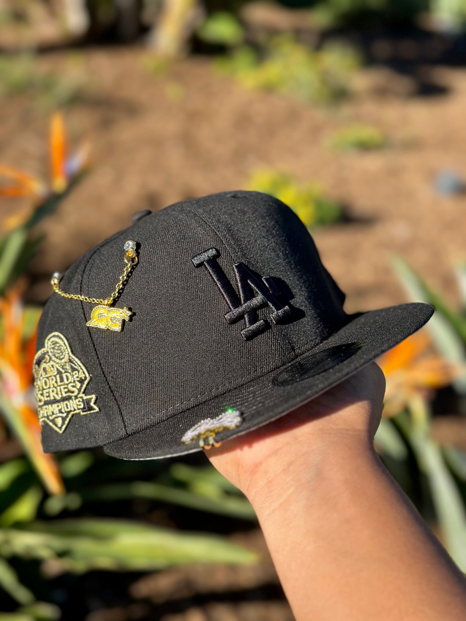 NEW ERA EXCLUSIVE 9FIFTY BLACKED OUT LOS ANGELES DODGERS SNAPBACK W/ 2024 WORLD SERIES CHAMPIONS SIDE PATCH