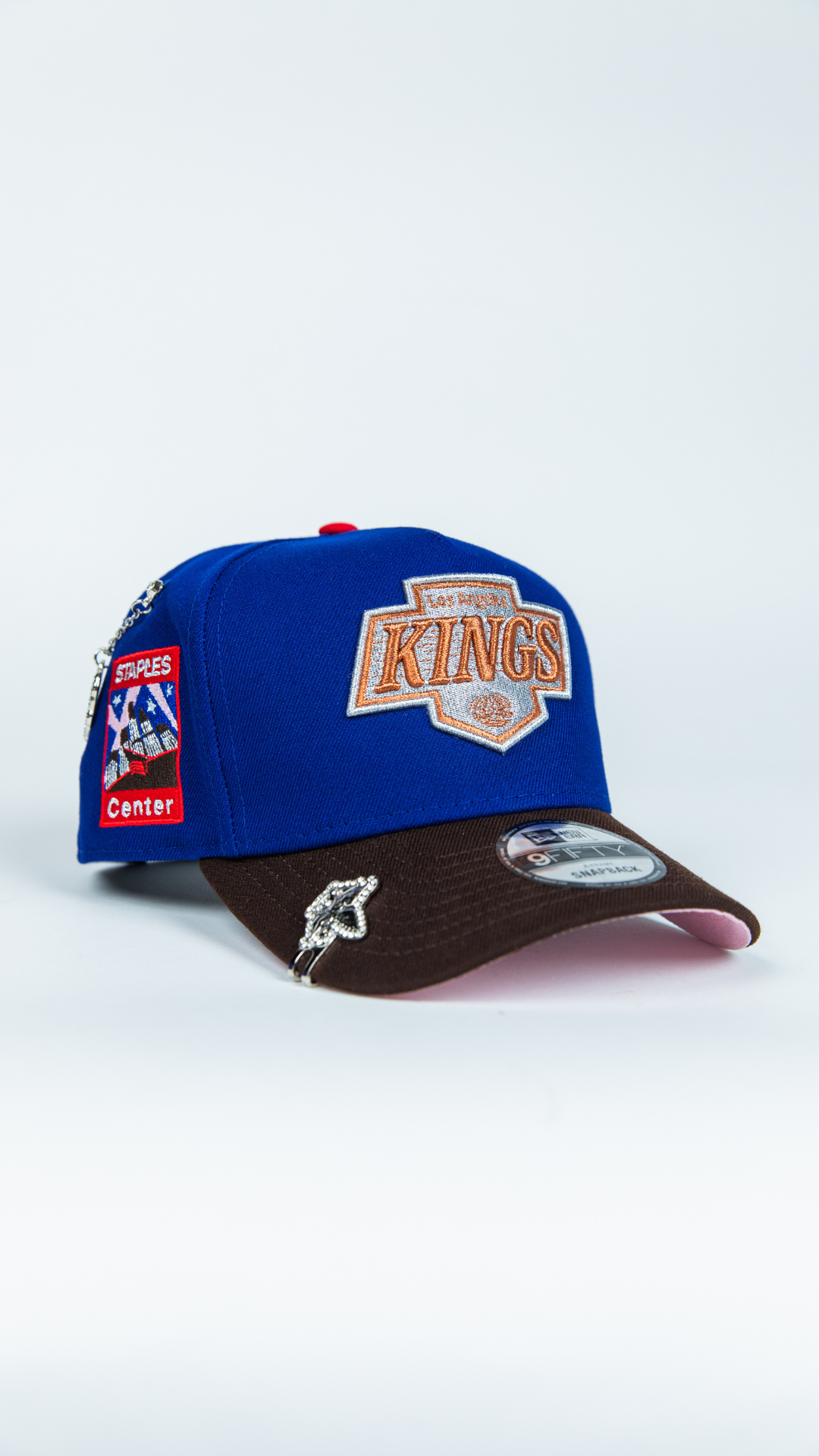 NEW ERA 9FIFTY A-FRAME BLUE/ BROWN LOS ANGELES KINGS SCRIPT SNAPBACK W/ STAPLES CENTER SIDE PATCH