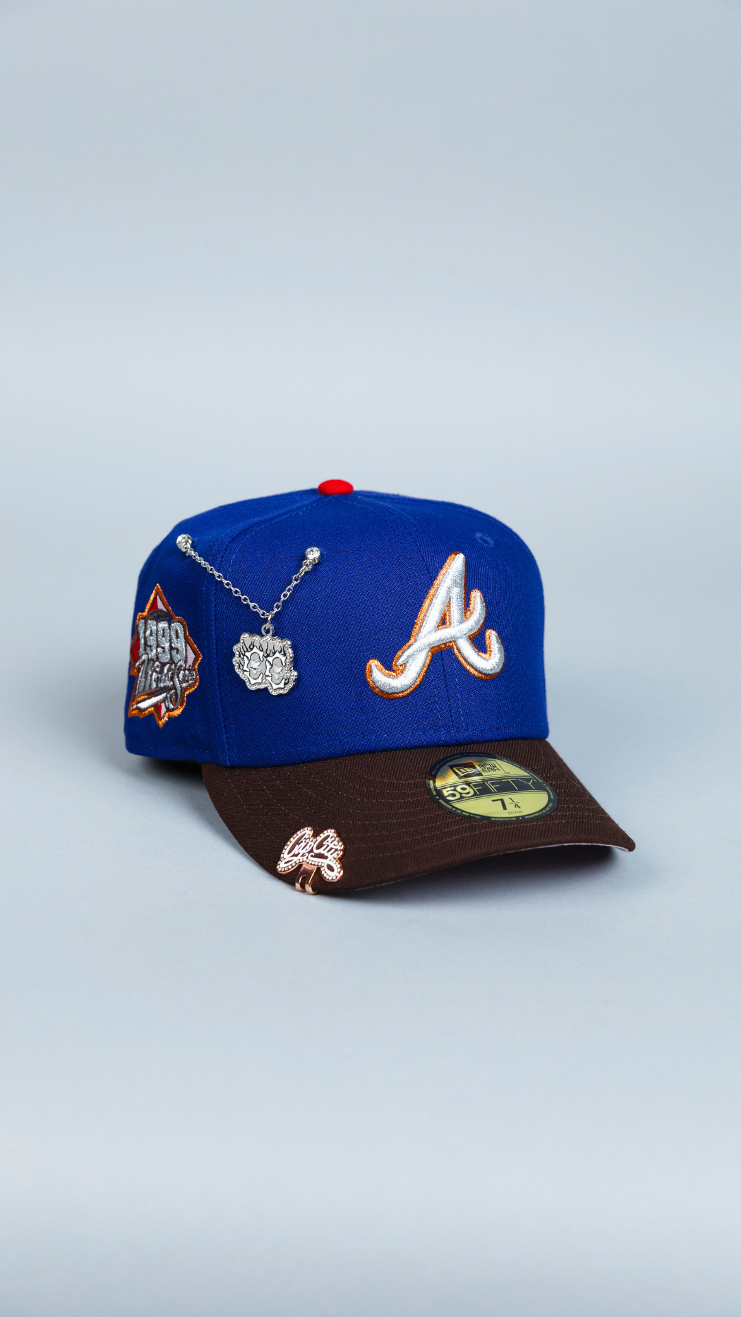 NEW ERA EXCLUSIVE 59FIFTY DARK BLUE/ BROWN ATLANTA BRAVES W/ 1999 WORLD SERIES SIDE PATCH