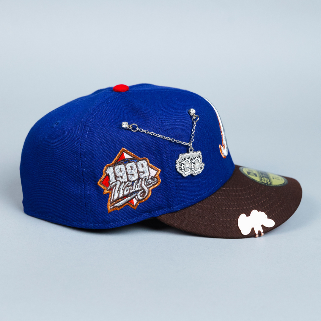 NEW ERA EXCLUSIVE 59FIFTY DARK BLUE/ BROWN ATLANTA BRAVES W/ 1999 WORLD SERIES SIDE PATCH