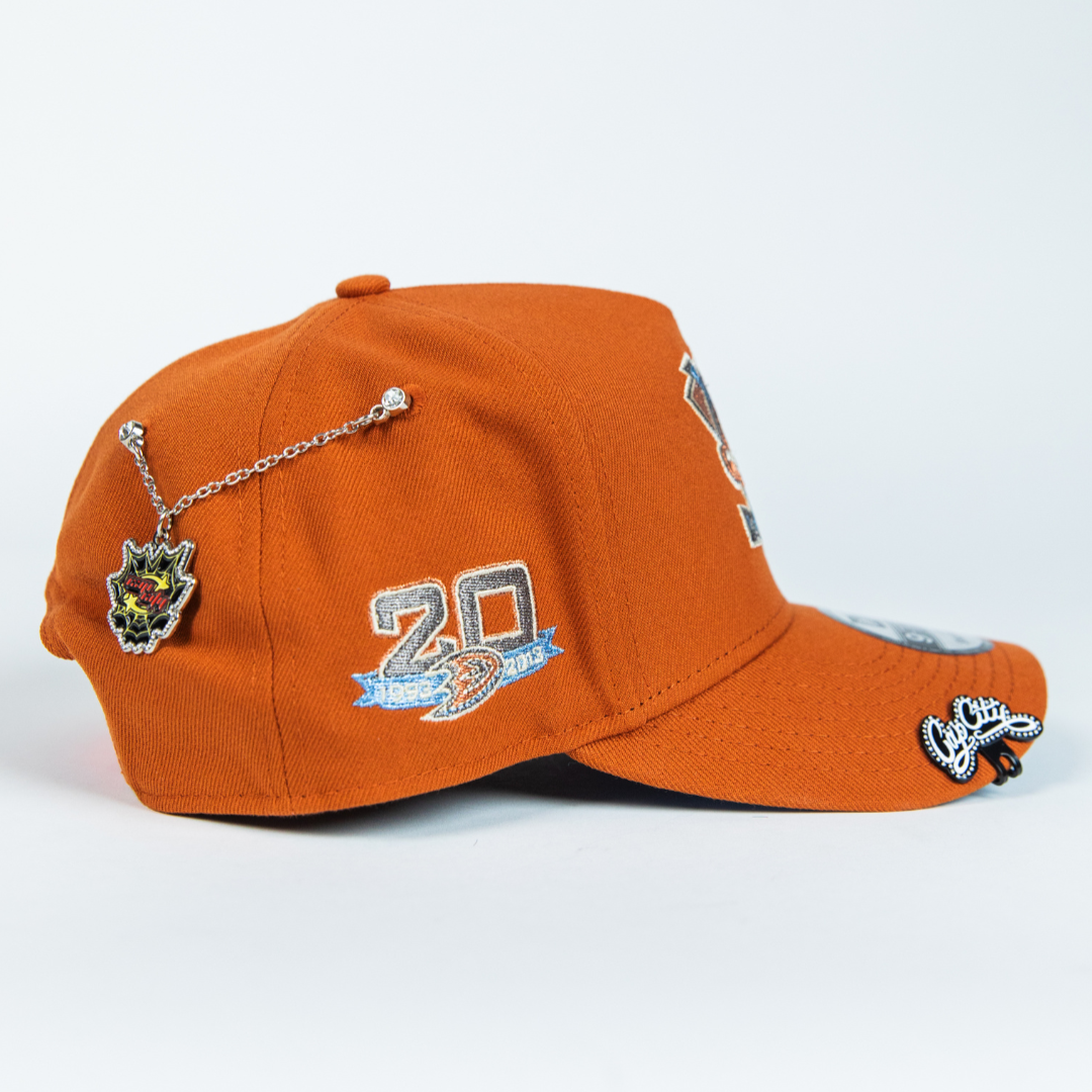 NEW ERA 9FIFTY A-FRAME RUST ANAHEIM DUCKS SNAPBACK W/ 20TH AMMIVERSARY SIDE PATCH
