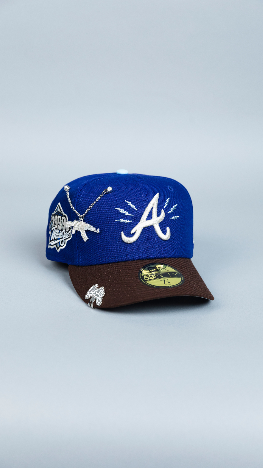 NEW ERA EXCLUSIVE 59FIFTY DARK BLUE/ BROWN ATLANTA BRAVES W/ 1999 WORLD SERIES SIDE PATCH