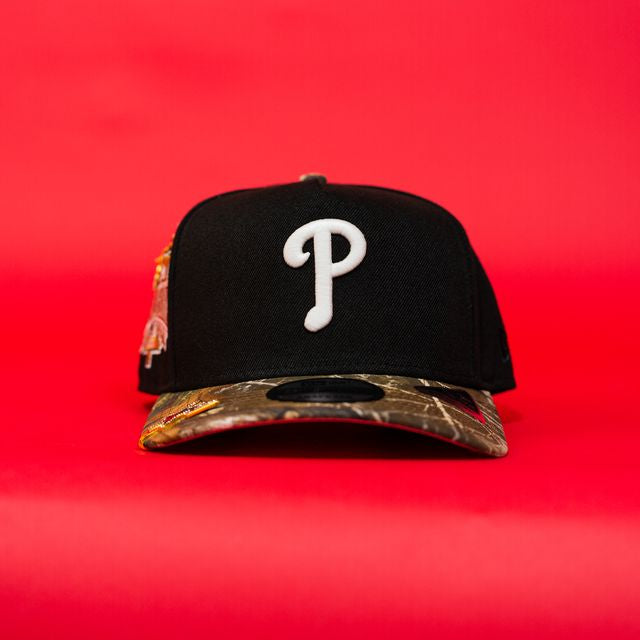 NEW ERA EXCLUSIVE 9FIFTY A-FRAME BLACK/ REALTREE PHILADELPHIA PHILLIES SNAPBACK W/ 1996 ALL STAR GANE SIDE PATCH