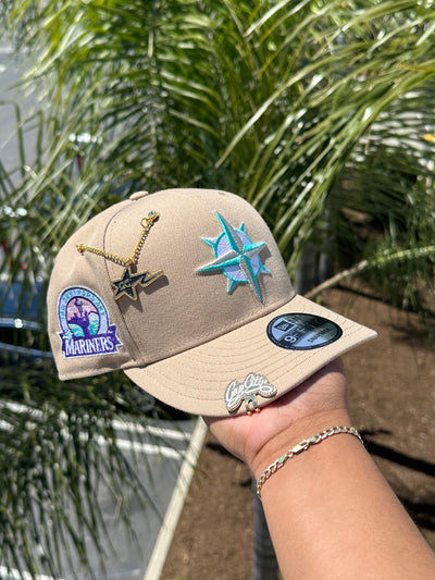 NEW ERA EXCLUSIVE 9FIFTY KHAKI SEATTLE MARINERS SNAPBACK W/ 30TH ANNIVERSARY PATCH (PINK UV)