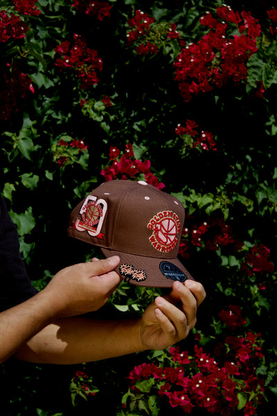 NEW MITCHELL & NESS BROWN GOLDEN STATE WARRIORS DYNASTY FITTED W/ 50TH ANNIVERSARY PATCH (PINK UV)