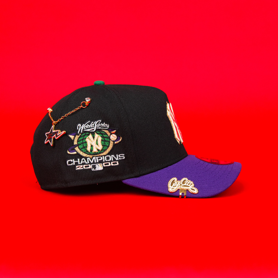 NEW ERA 9FIFTY A-FRAME BLACK/ PURPLE NEW YORK YANKEES SNAPBACK W/ 2000 WORLD SERIES CHAMPIONS SIDE PATCH