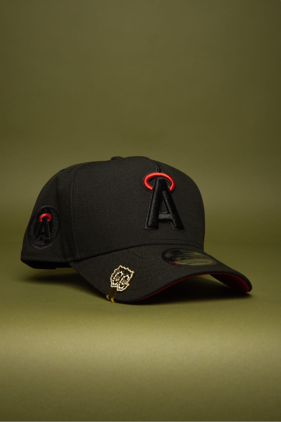 NEW ERA 9FIFTY A-FRAME BLACKED OUT ANAHEIM ANGELS SNAPBACK W/ 25TH ANNIVERSARY SIDE PATCH