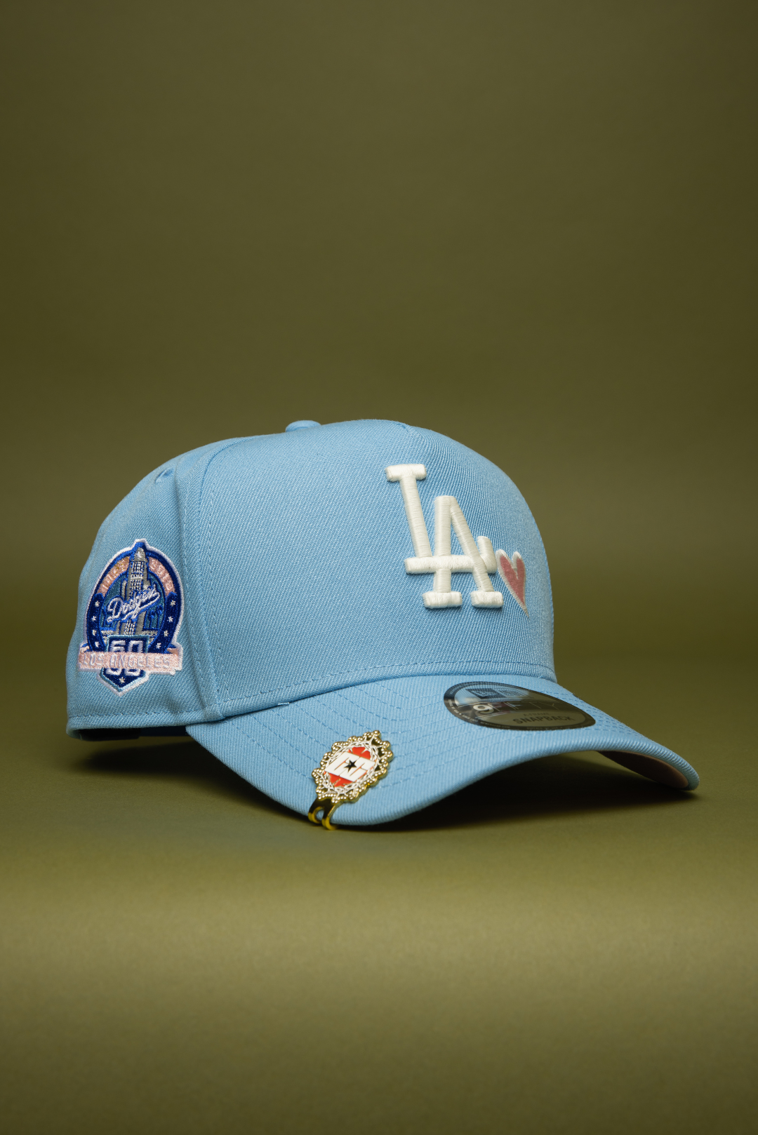 NEW ERA 9FIFTY A-FRAME ICY BLUE LOS ANGELES DODGERS SNAPBACK W/ PINK HEART + 60TH ANNIVERSARY SIDE PATCH