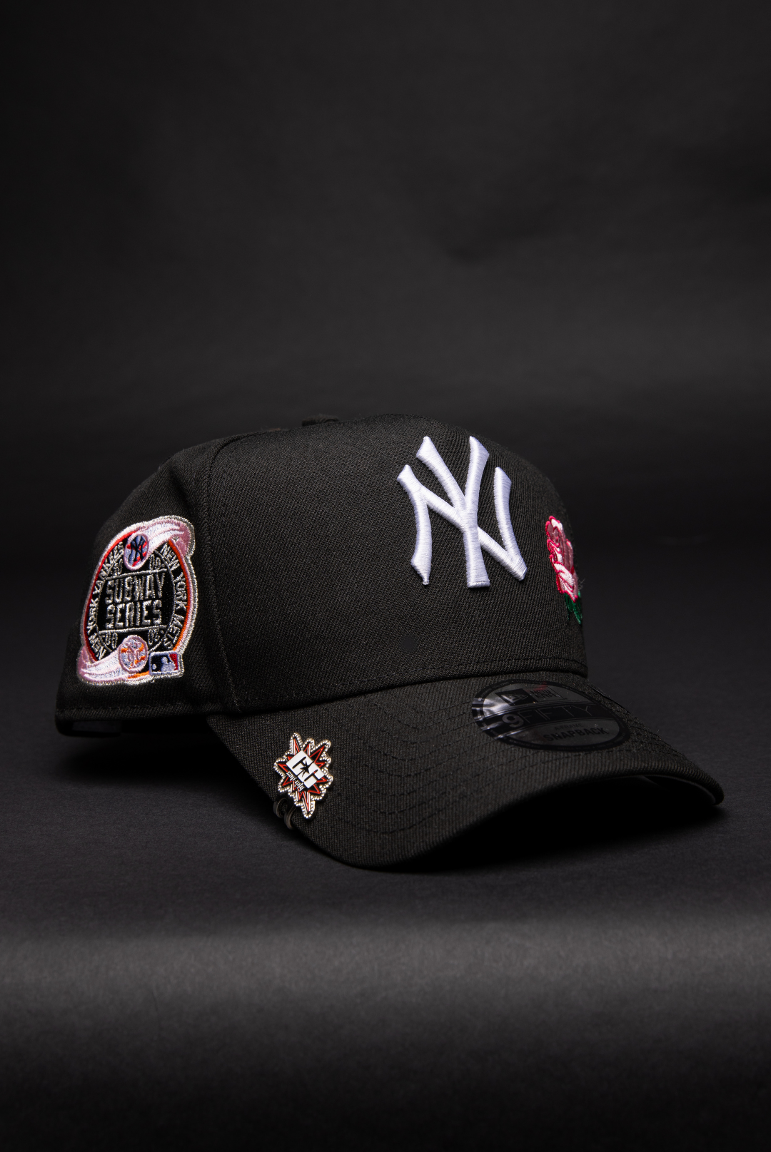 NEW ERA 9FIFTY A-FRAME BLACK NEW YORK YANKEES SNAPBACK W/ PINK ROSE + SUBWAY SERIES SIDE PATCH