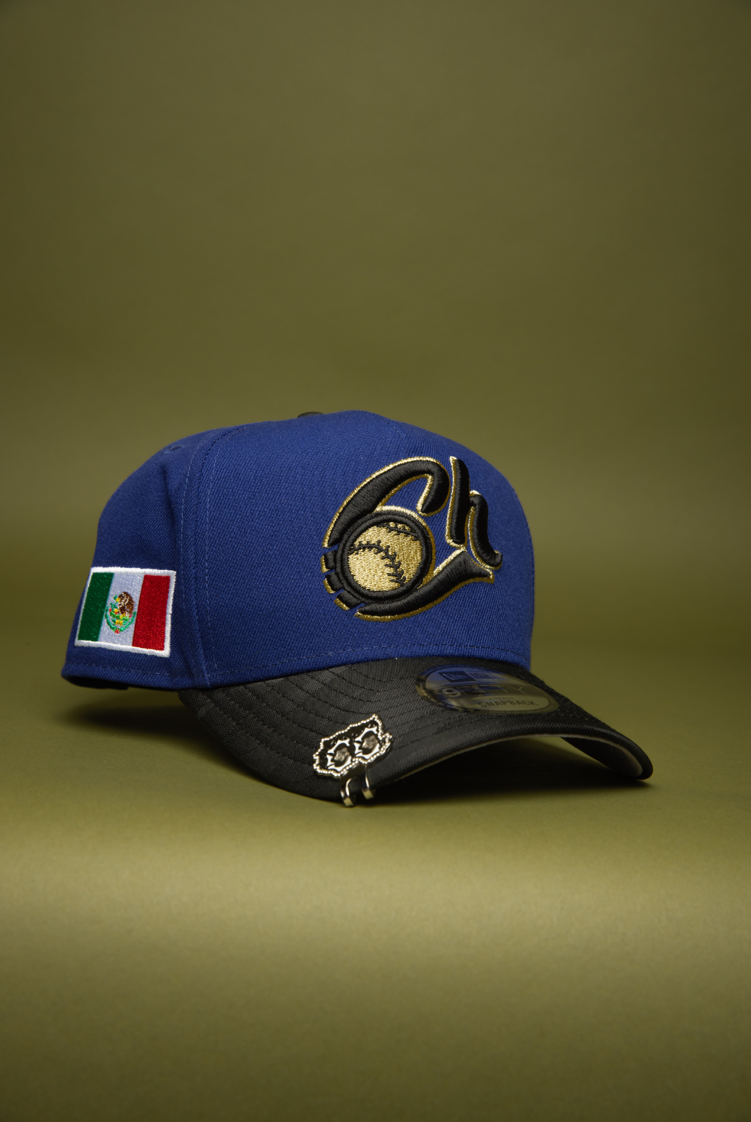 NEW ERA 9FIFTY A-FRAME DARK BLUE/BLACK CAMO CHARROS DE JALISCO SNAPBACK W/ MEXICO FLAG SIDE PATCH