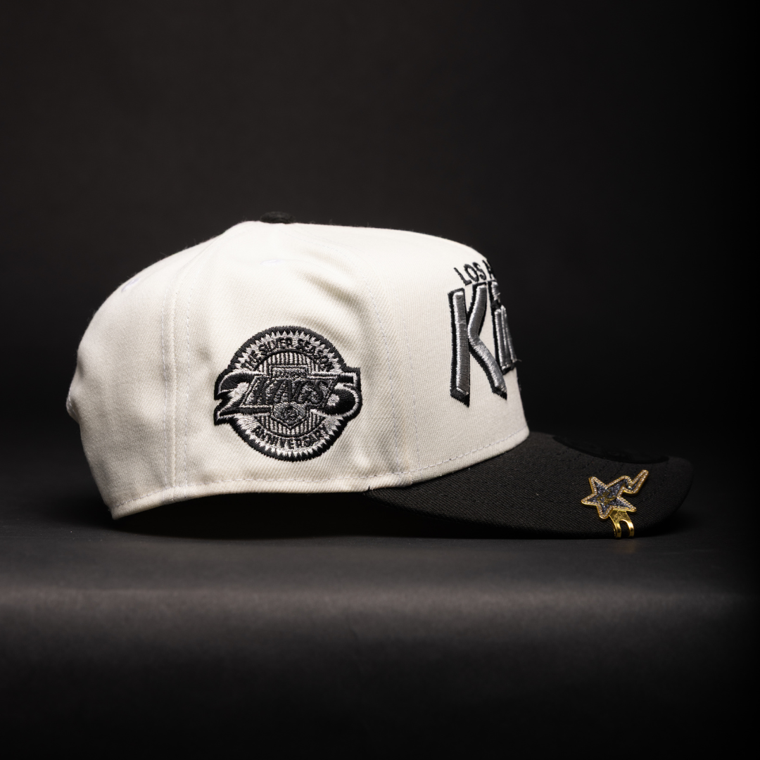 NEW ERA 9FIFTY A-FRAME CHROME/BLACK LOS ANGELES KINGS SCRIPT SNAPBACK W/ 25TH ANNIVERSARY SIDE PATCH