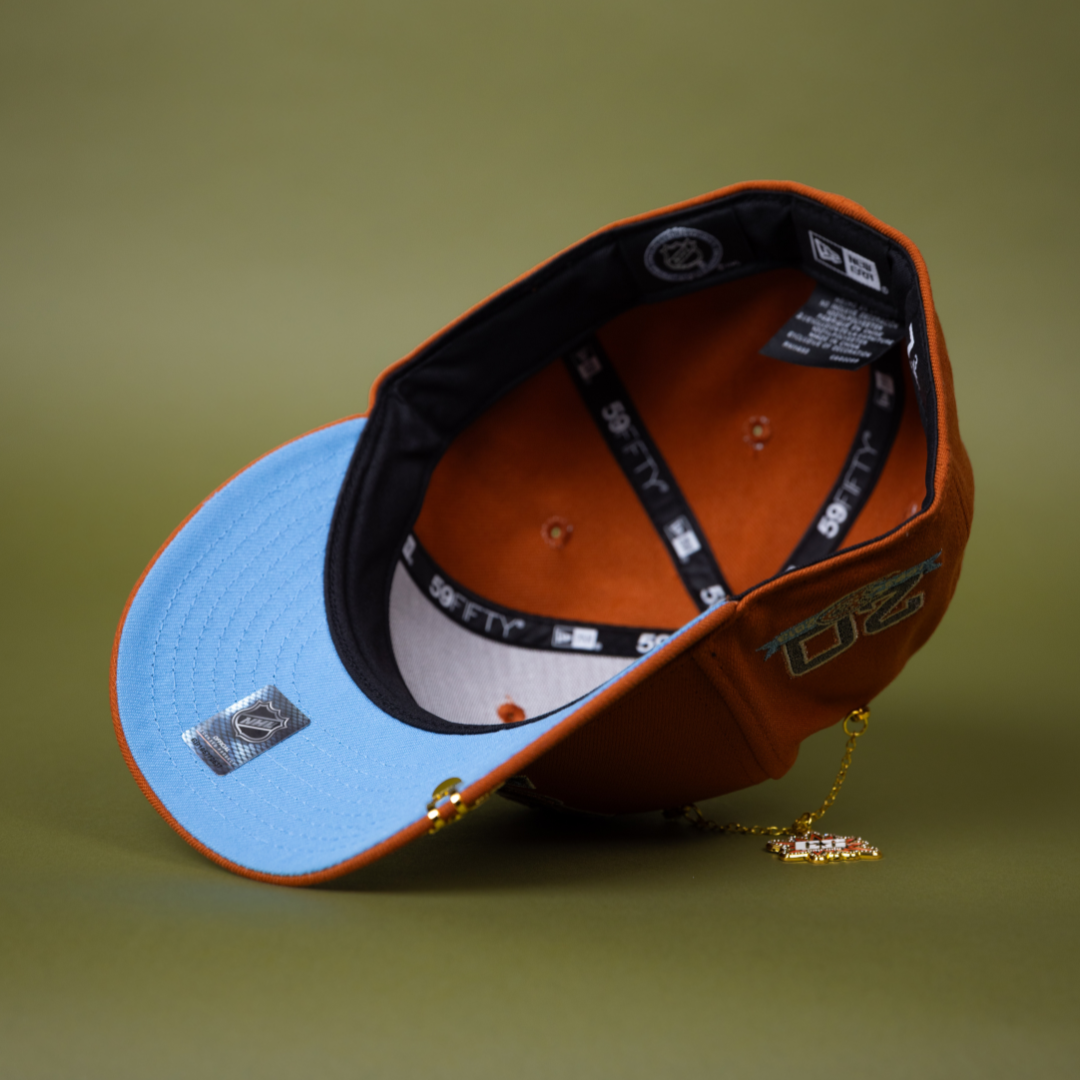 NEW ERA EXCLUSIVE 59FIFTY RUST ANAHEIM DUCKS W/ 20TH ANNIVERSARY SIDE PATCH