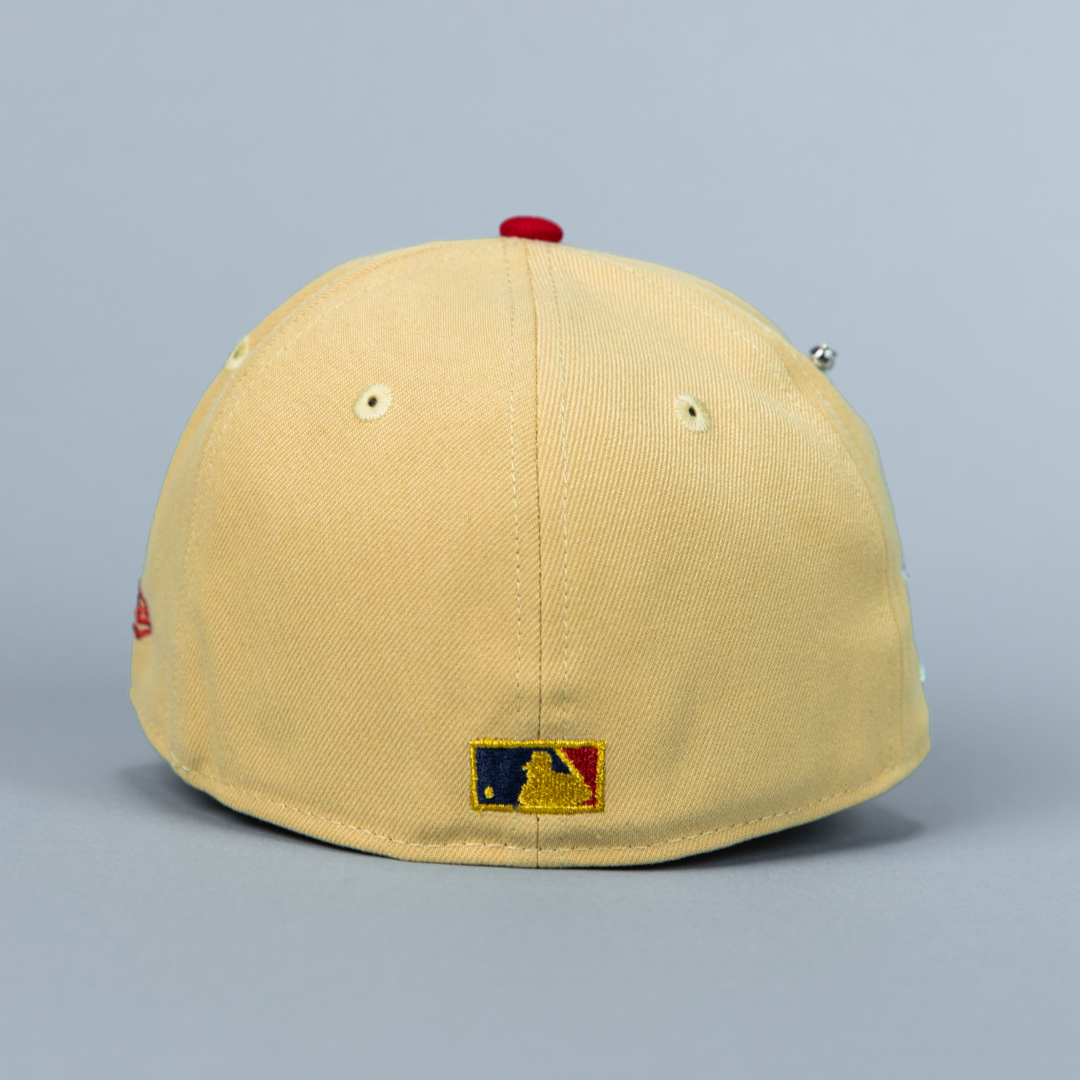 NEW ERA 59FIFTY VEGAS GOLD/ NAVY ATLANTA BRAVES W/ 1999 WORLD SERIES SIDE PATCH