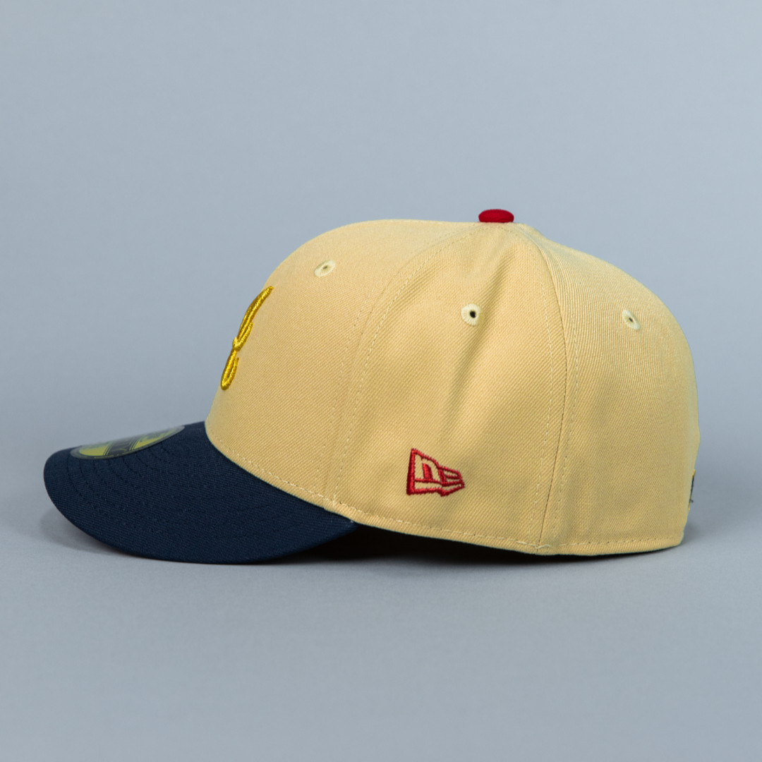 NEW ERA 59FIFTY VEGAS GOLD/ NAVY ATLANTA BRAVES W/ 1999 WORLD SERIES SIDE PATCH