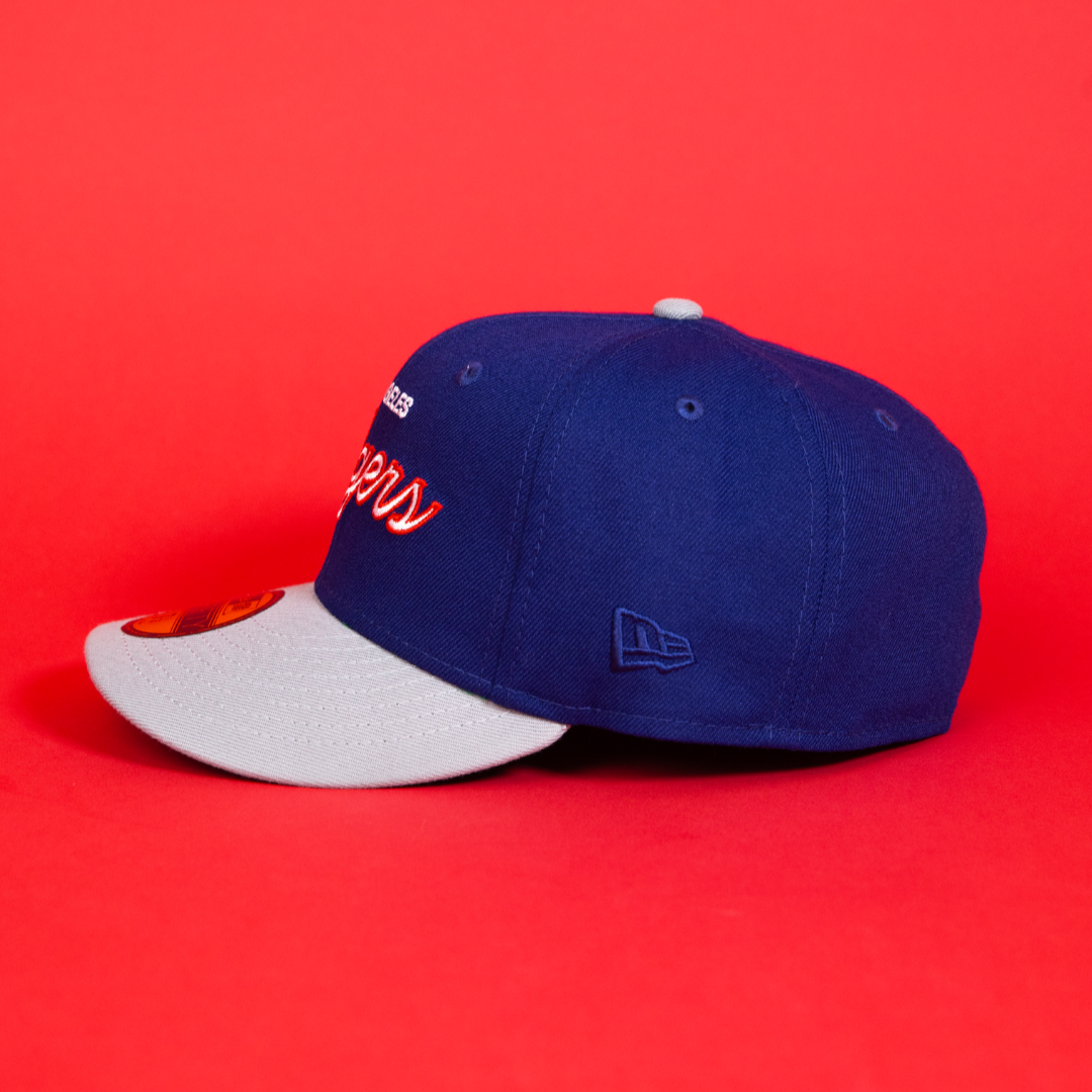 NEW ERA EXCLUSIVE 59FIFTY BLUE/ GREY LOS ANGELES DODGERS SCRIPT W/ LA LOGO SIDE PATCH