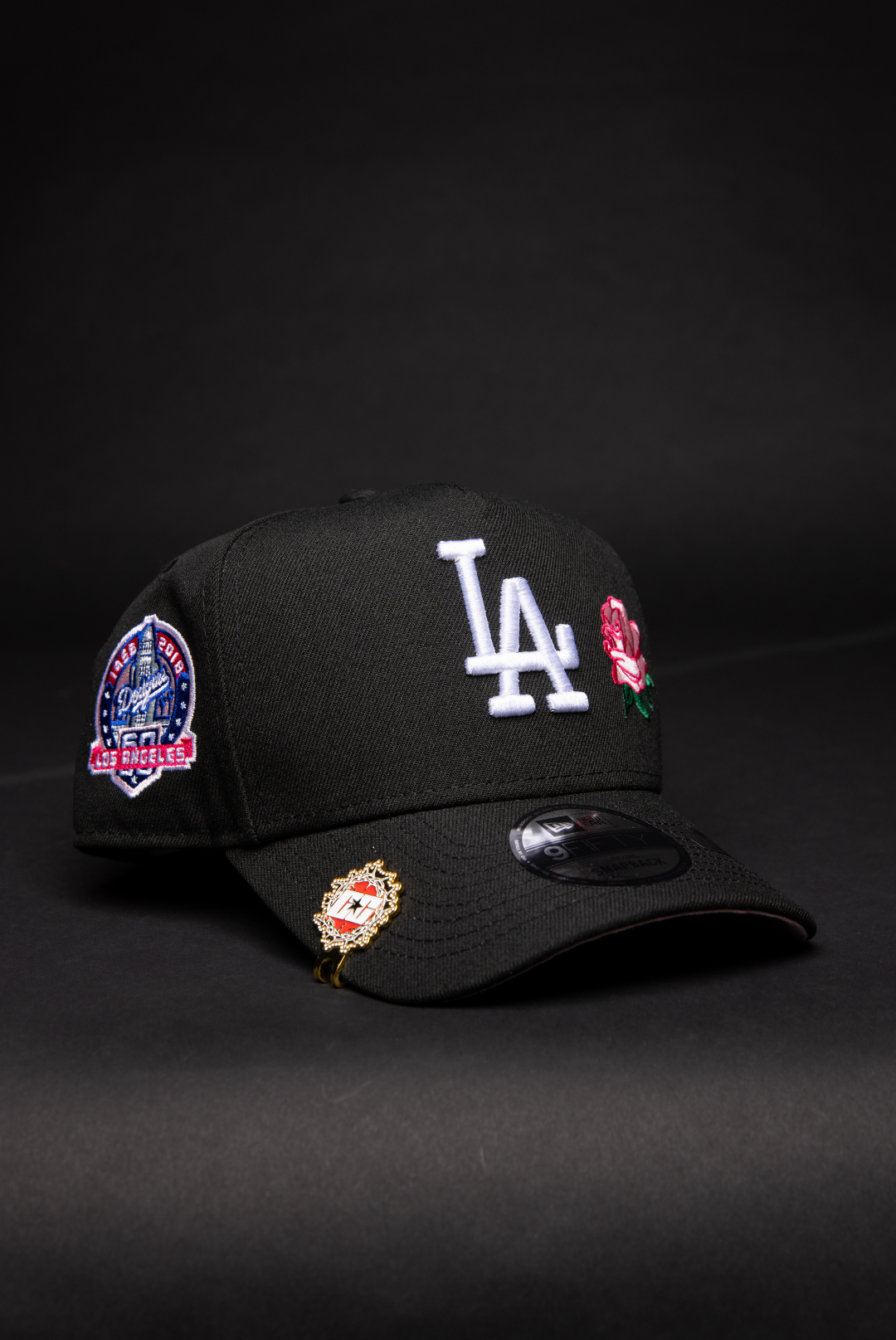 NEW ERA 9FIFTY A-FRAME BLACK LOS ANGELES DODGERS SNAPBACK W/ PINK ROSE + 60TH ANNIVERSARY SIDE PATCH