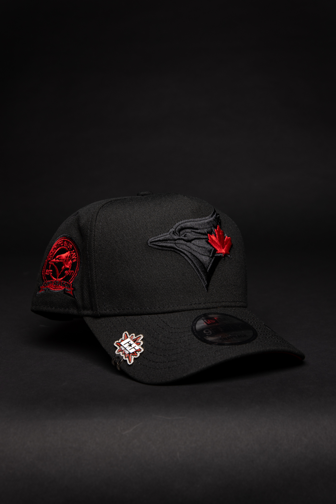 NEW ERA 9FIFTY A-FRAME BLACKED OUT TORONTO BLUE JAYS SNAPBACK W/ 40TH SEASON SIDE PATCH