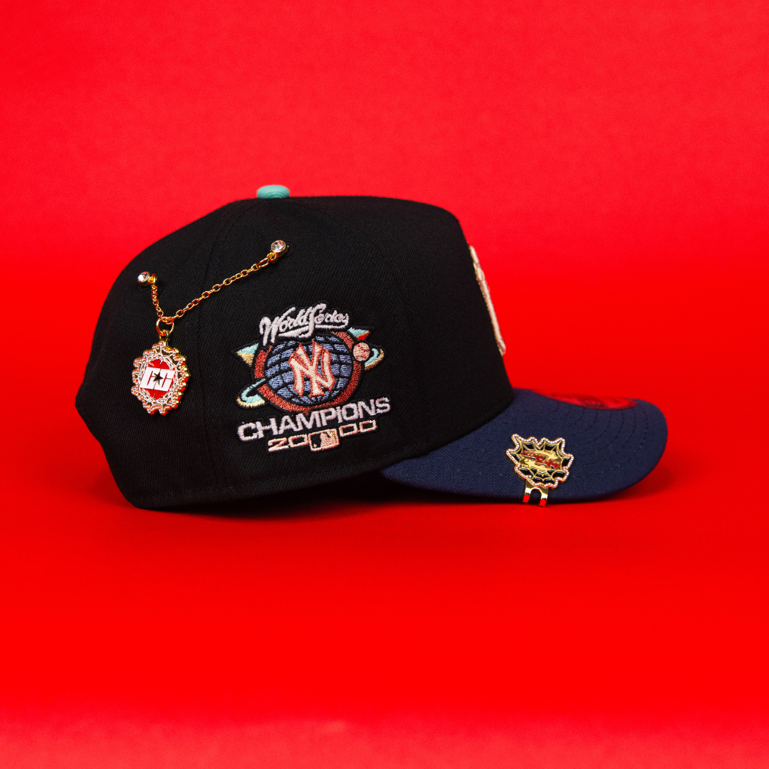 NEW ERA 9FIFTY A-FRAME BLACK/ NAVY NEW YORK YANKEES SNAPBACK W/ 2000 WORLD SERIES CHAMPIONS SIDE PATCH