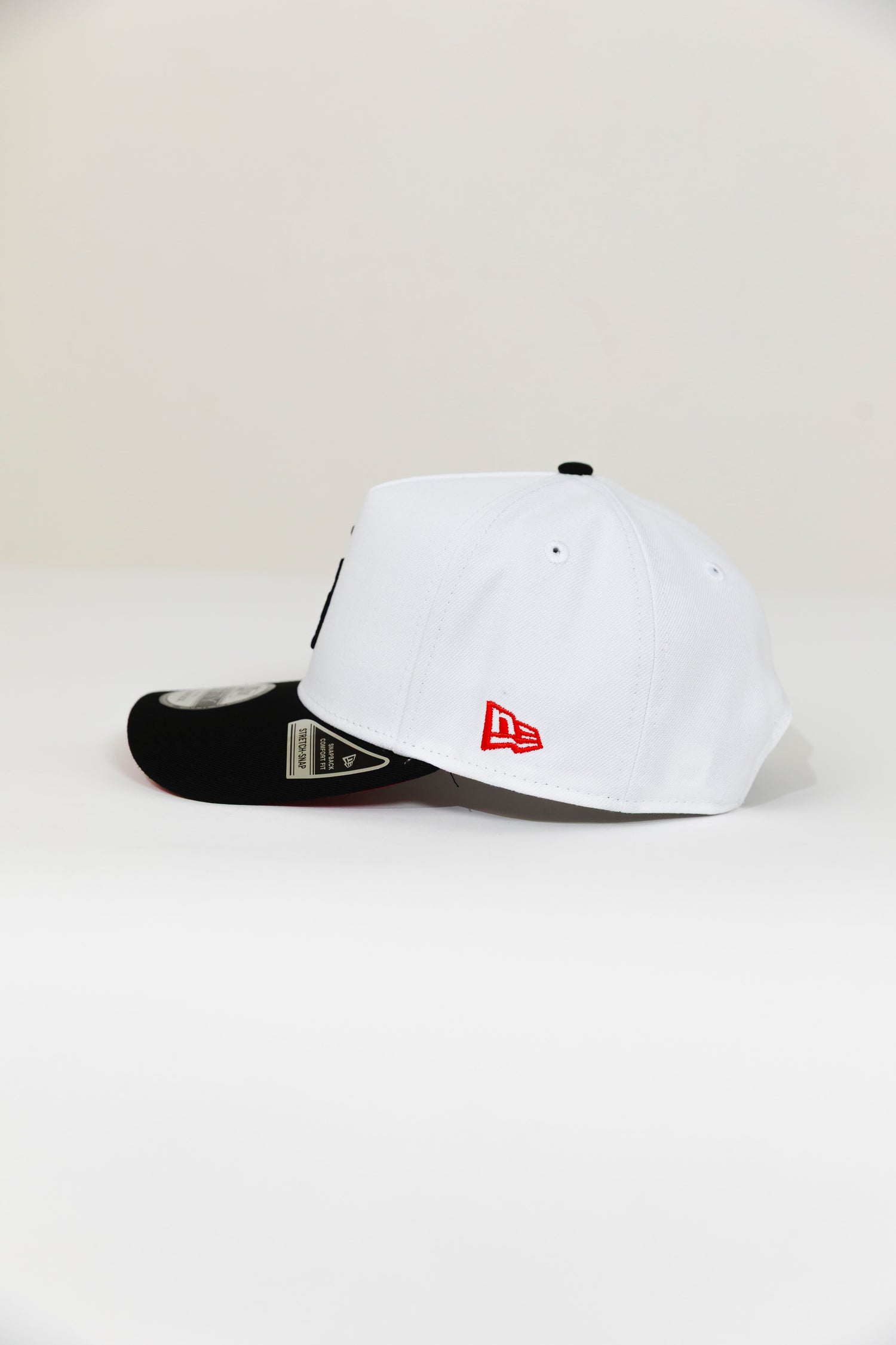 NEW ERA EXCLUSIVE 9FIFTY A-FRAME PEARL WHITE LOS ANGELES DODGERS W/ 50TH ANNIVERSARY SIDE PATCH