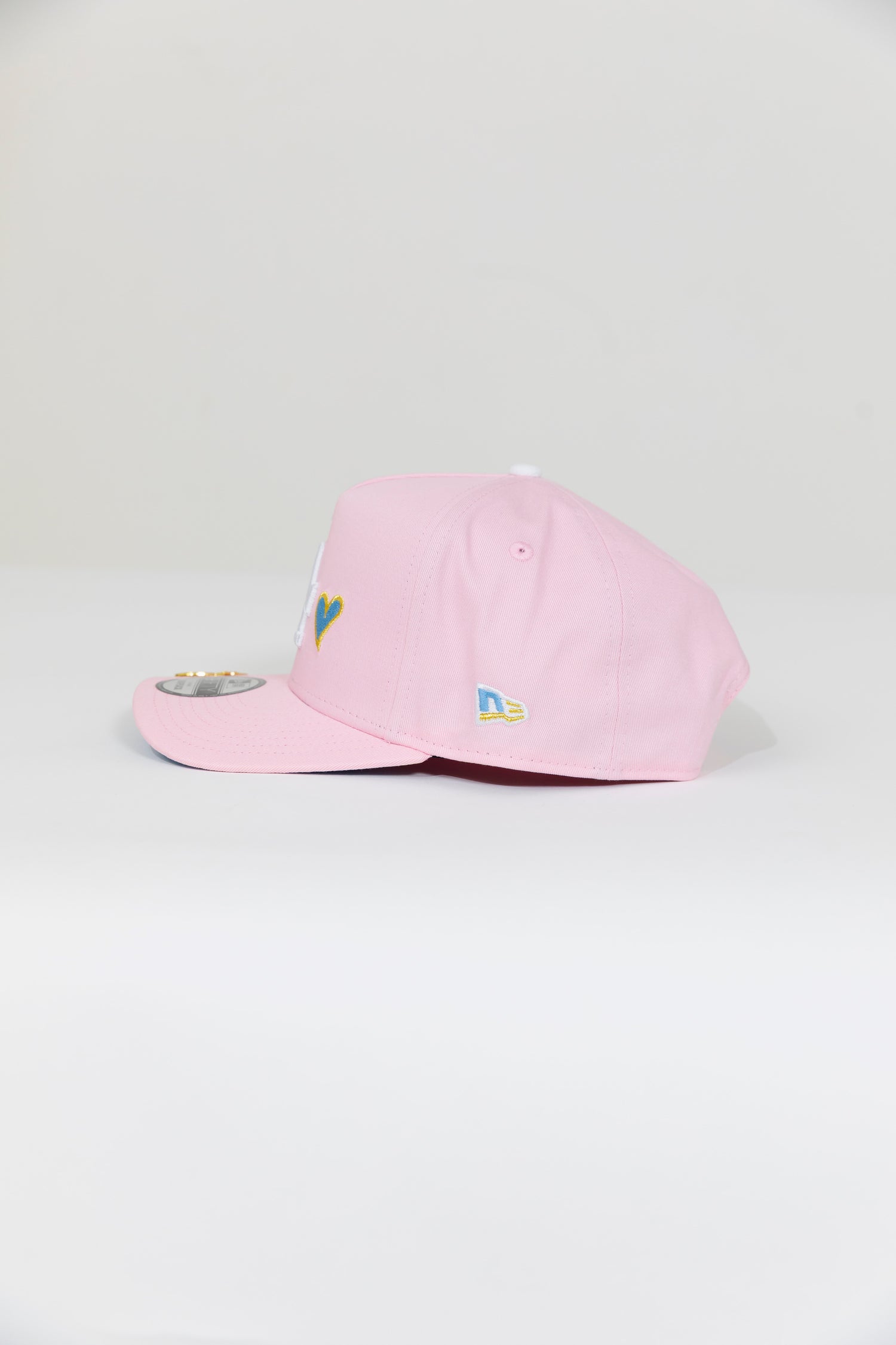 NEW ERA EXCLUSIVE 9FIFTY A-FRAME PINK LOS ANGELES DODGERS W/ ICY HEART + 50TH ANNIVERSARY SIDE PATCH