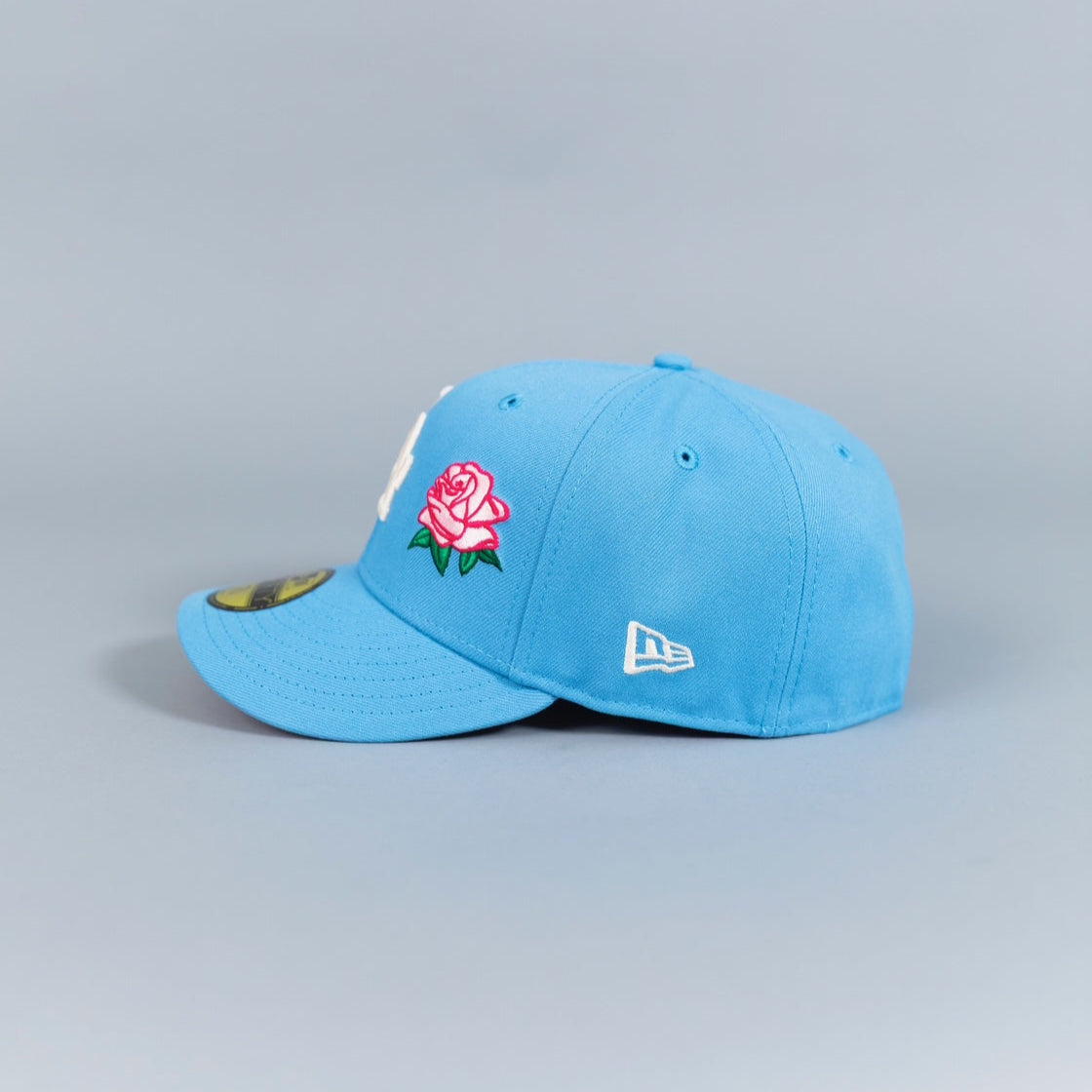 NEW ERA EXCLUSIVE 59FIFTY ICY BLUE LOS ANGELES DODGERS W/ PINK ROSE + 50TH ANNIVERSARY SIDE PATCH