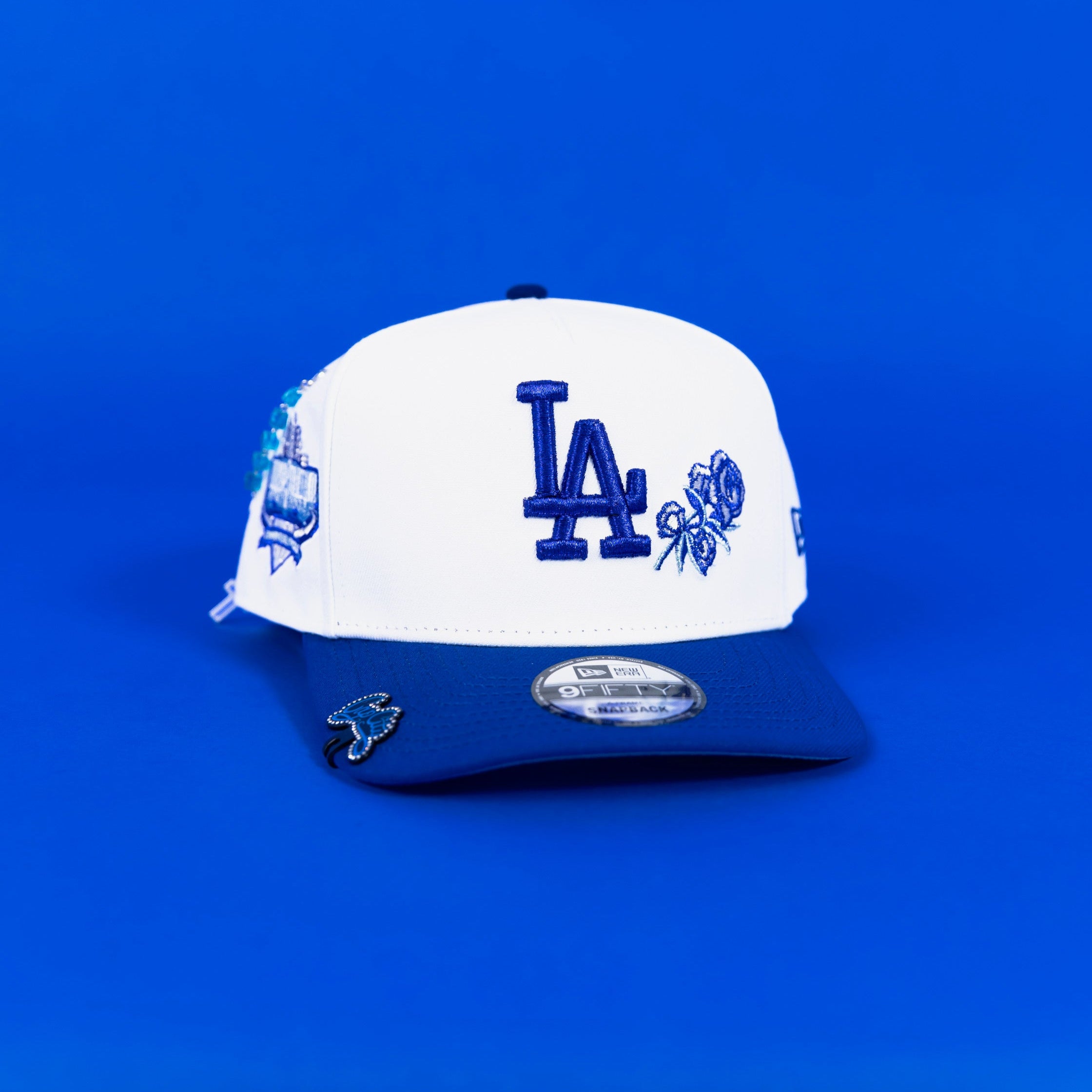 NEW ERA EXCLUSIVE 9FIFTY A-FRAME PEARL WHITE LOS ANGELES DODGERS SNAPBACK W/ ROSE + 40TH ANNIVERSARY SIDE PATCH