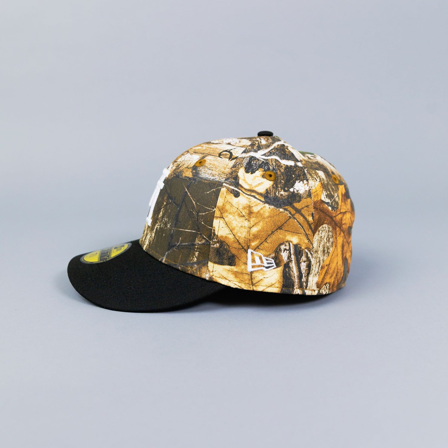 NEW ERA 59FIFTY REALTREE/ BLACK UPSIDE DOWN LOS ANGELES DODGERS W/ 40TH ANNIVERSARY SIDE PATCH