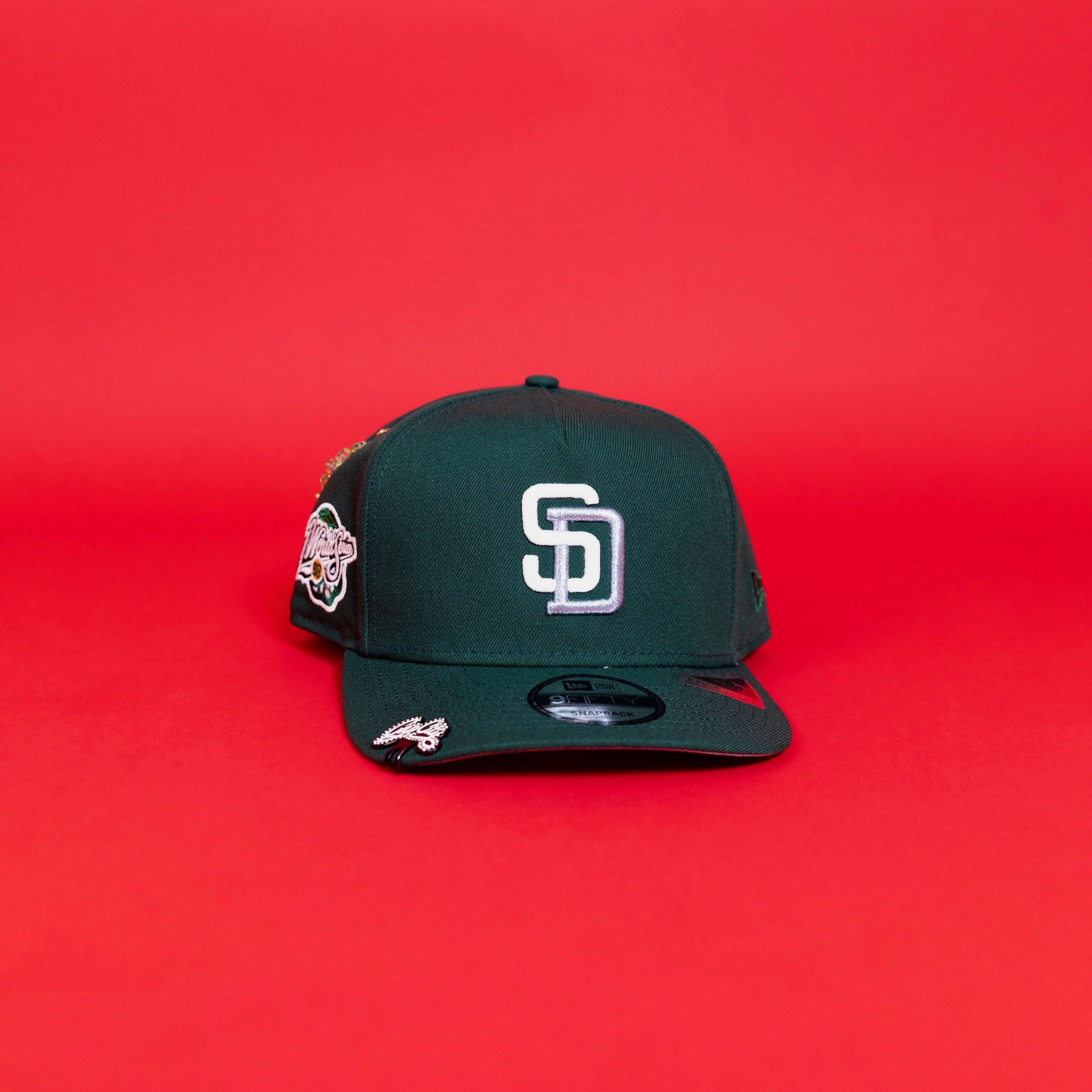 NEW ERA EXCLUSIVE 9FIFTY A-FRAME FOREST GREEN SAN DIEGO PADRES SNAPBACK W/ 1999 WORLD SERIES SIDE PATCH