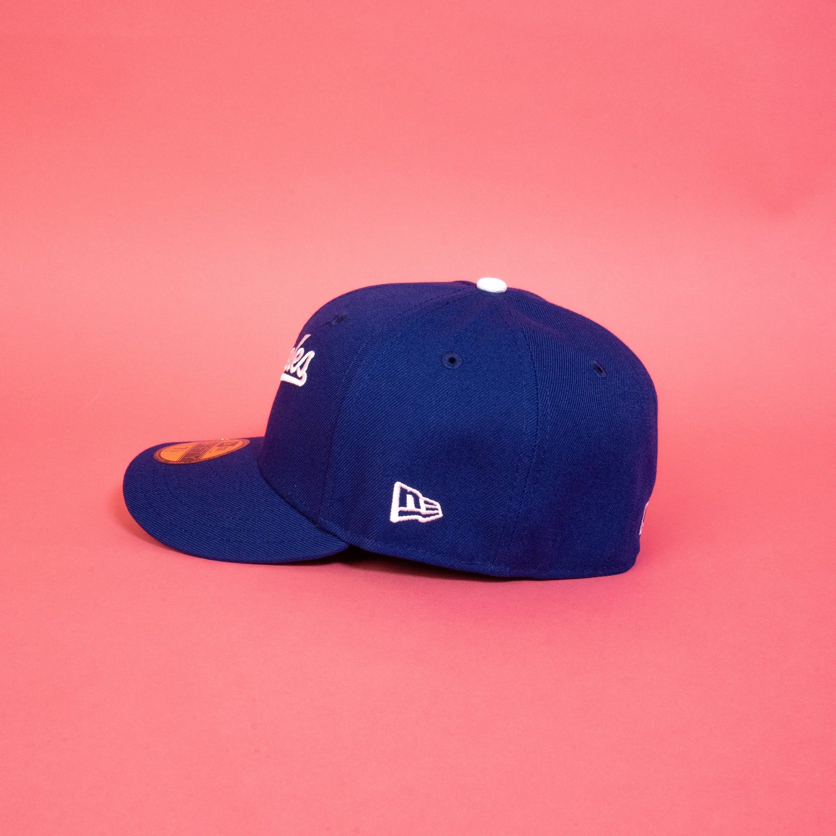 NEW ERA 59FIFTY BLUE LOS ANGELES DODGERS SCRIPT W/ 2024 WORLD SERIES CHAMPIONS SIDE PATCH