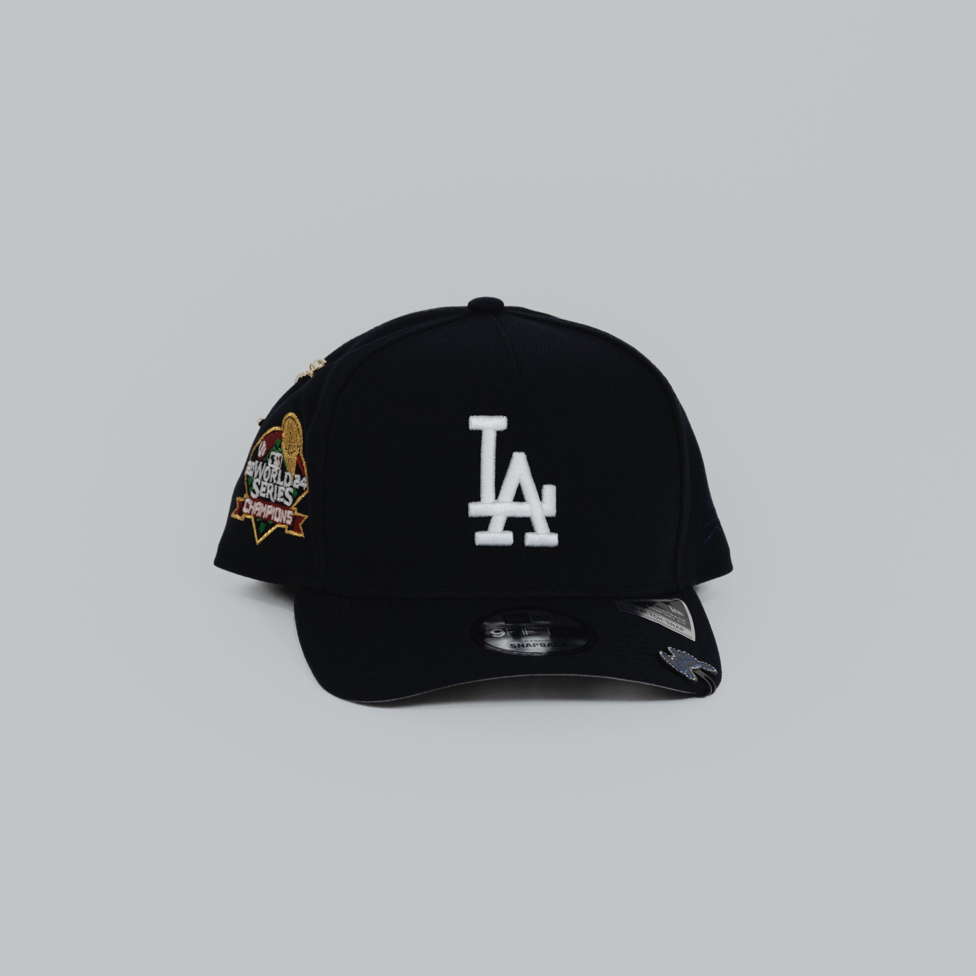 NEW ERA EXCLUSIVE 9FIFTY A-FRAME NAVY LOS ANGELES DODGERS W/ 2024 WORLD SERIES CHAMPIONS SIDE PATCH