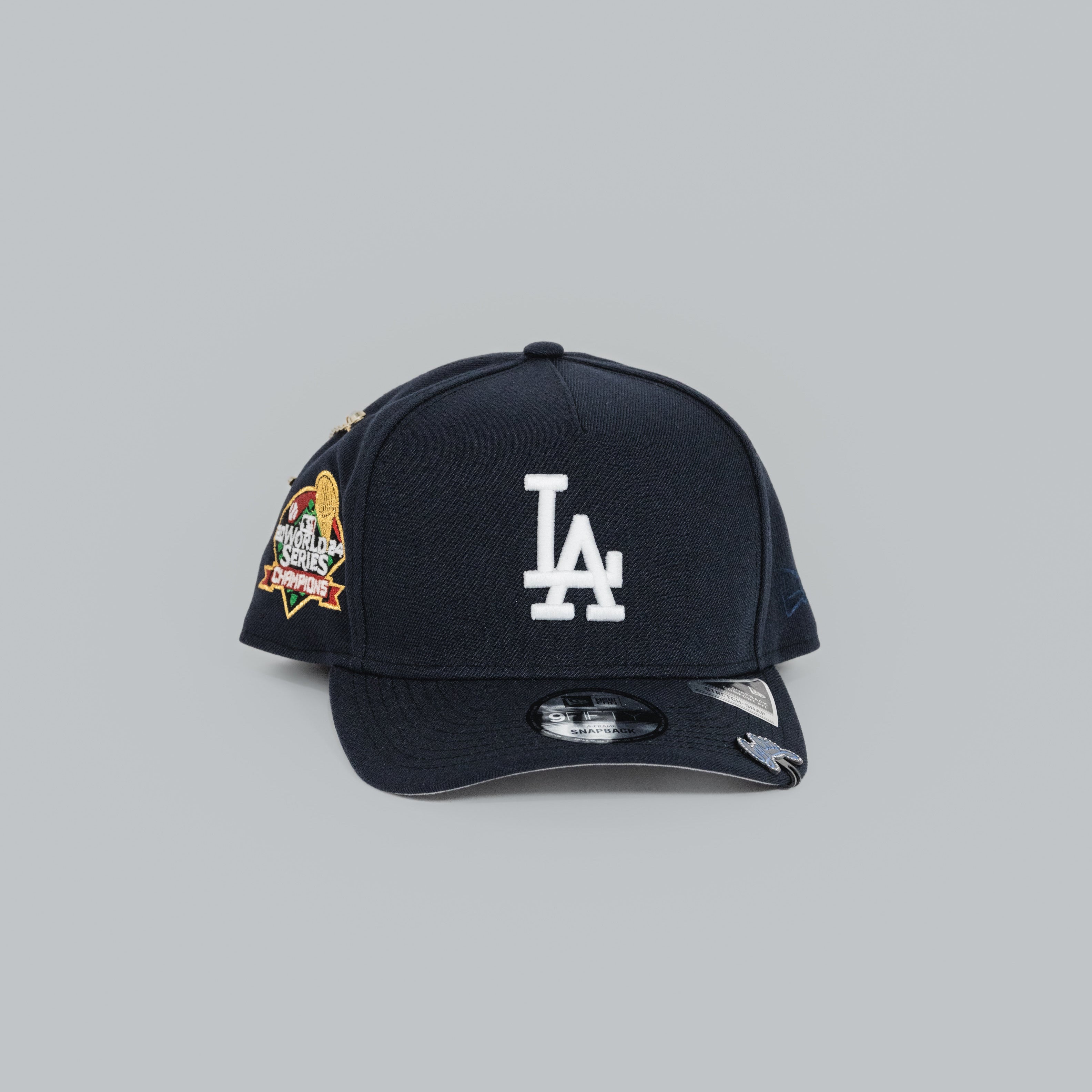 NEW ERA EXCLUSIVE 9FIFTY A-FRAME NAVY LOS ANGELES DODGERS W/ 2024 WORLD SERIES CHAMPIONS SIDE PATCH