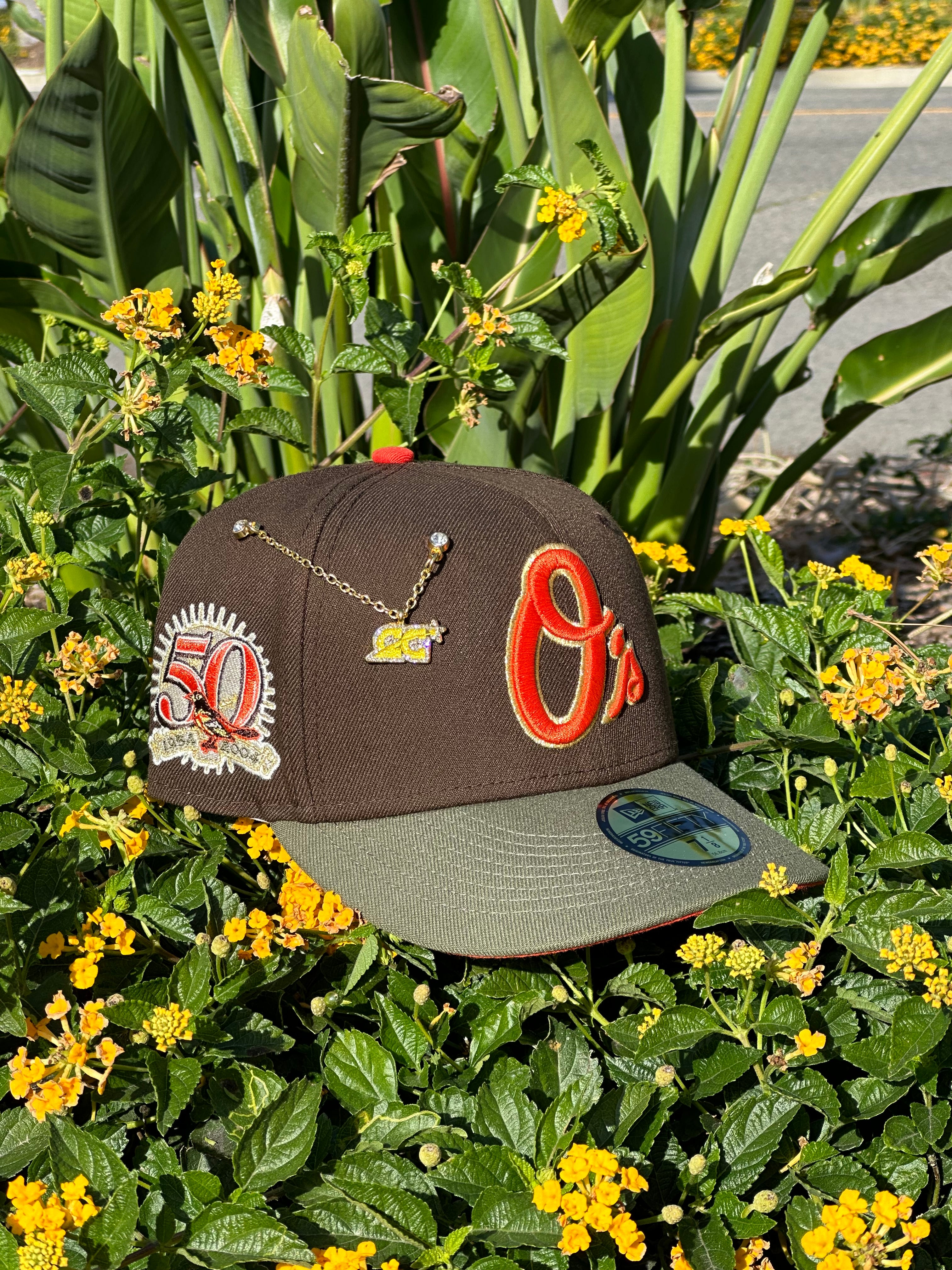 EXCLUSIVO DE NEW ERA 59FIFTY MARRÓN/OLIVA BALTIMORE ORIOLES CON PARCHE DEL 50 ANIVERSARIO 