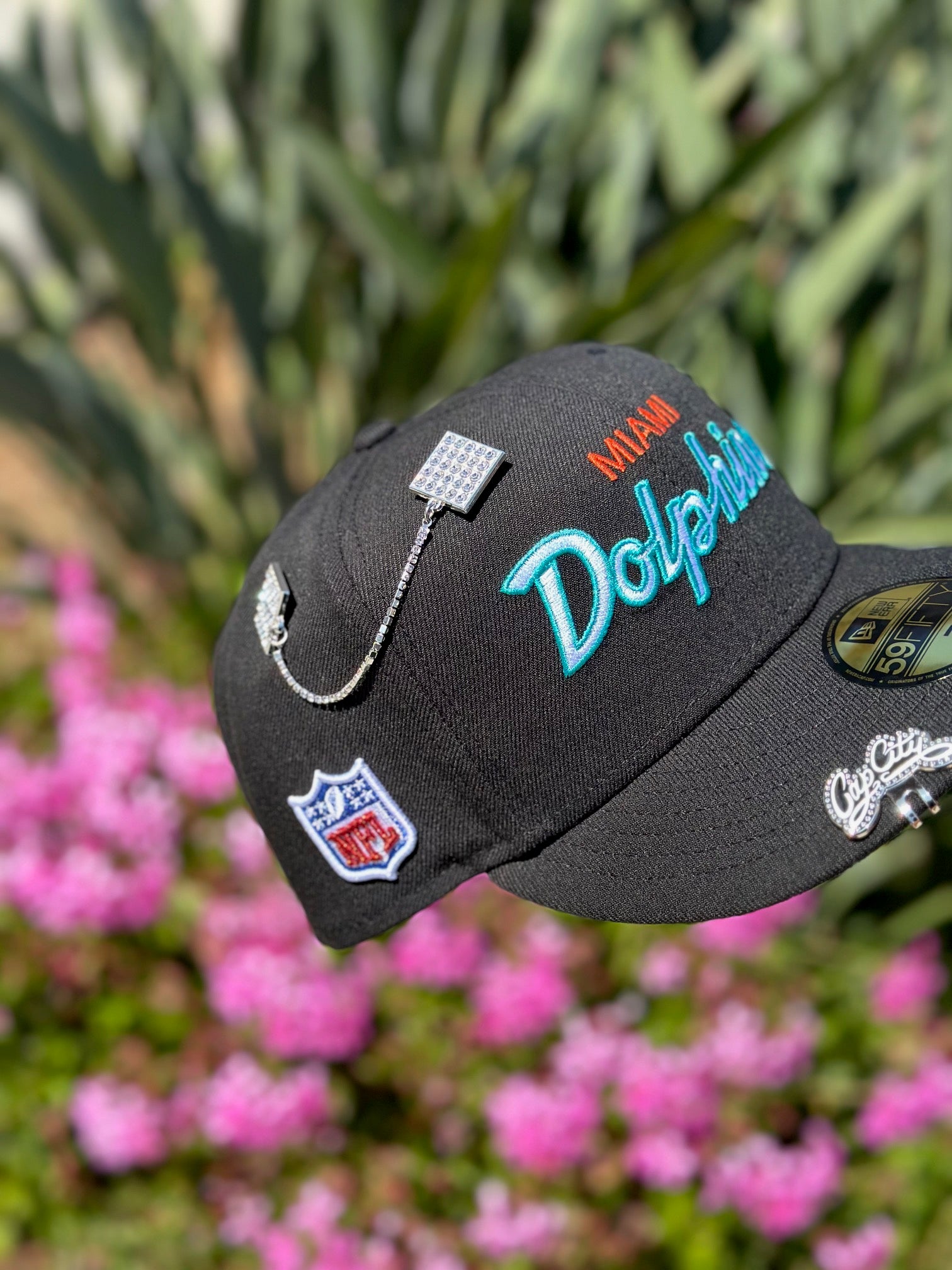 NEW ERA EXCLUSIVE 59FIFTY BLACK MIAMI DOLPHINS SCRIPT W/ NFL LOGO SIDE PATCH