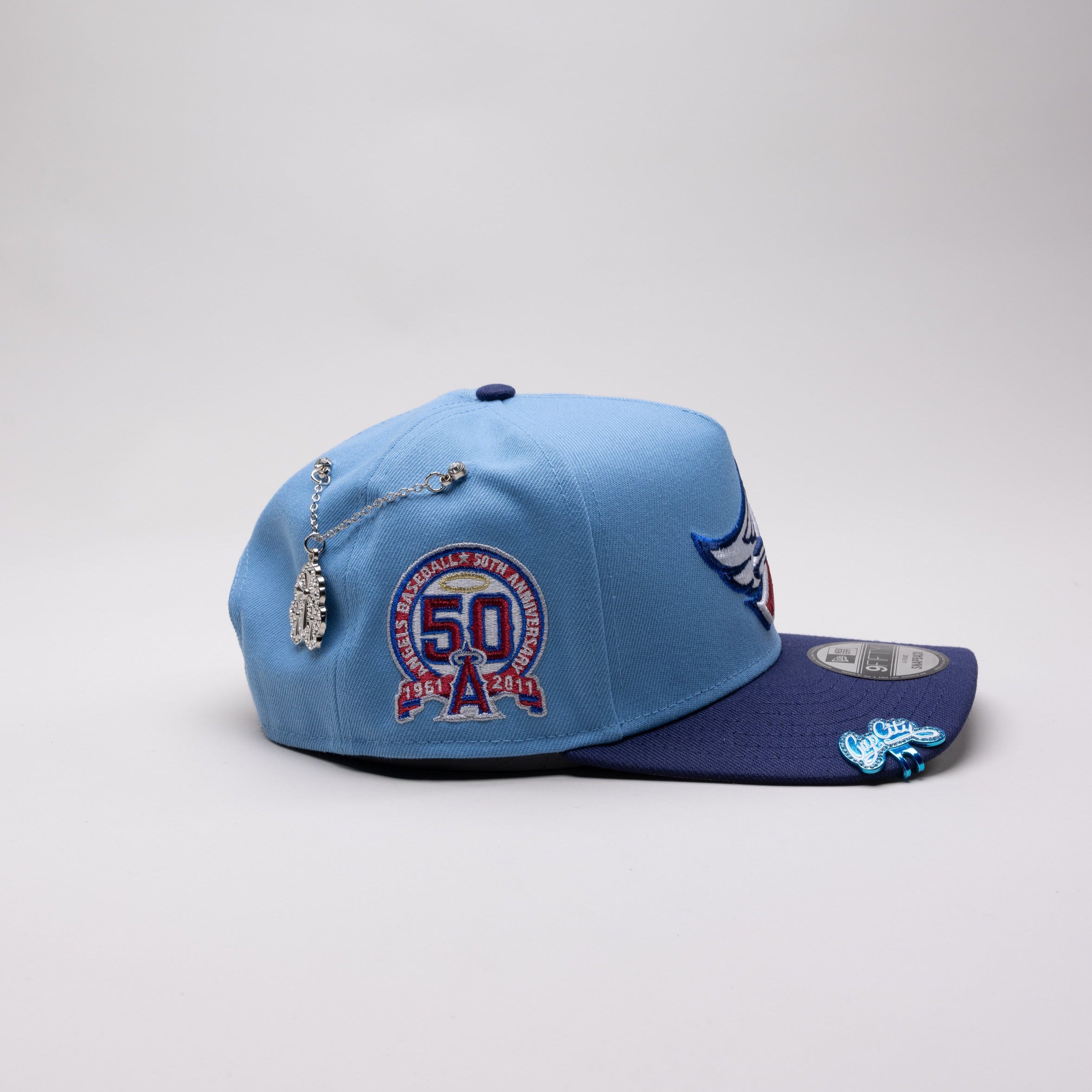 NEW ERA 9FIFTY A-FRAME SKY BLUE/NAVY ANAHEIM ANGELS SNAPBACK W/ 50TH ANNIVERSARY SIDE PATCH