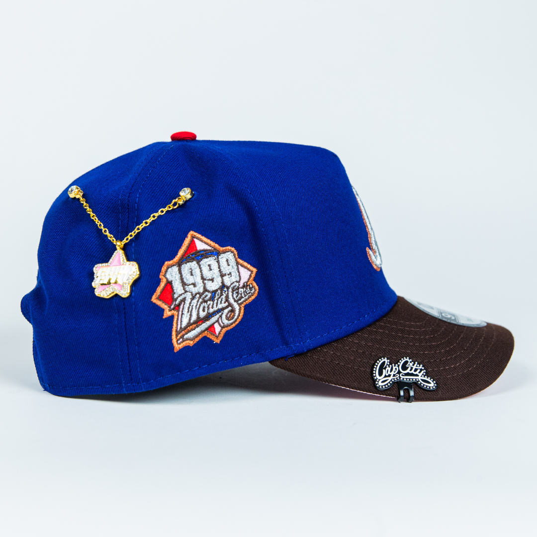 NEW ERA 9FIFTY A-FRAME BLUE/ BROWN ATLANTA BRAVES SNAPBACK W/ 1999 WORLD SERIES SIDE PATCH