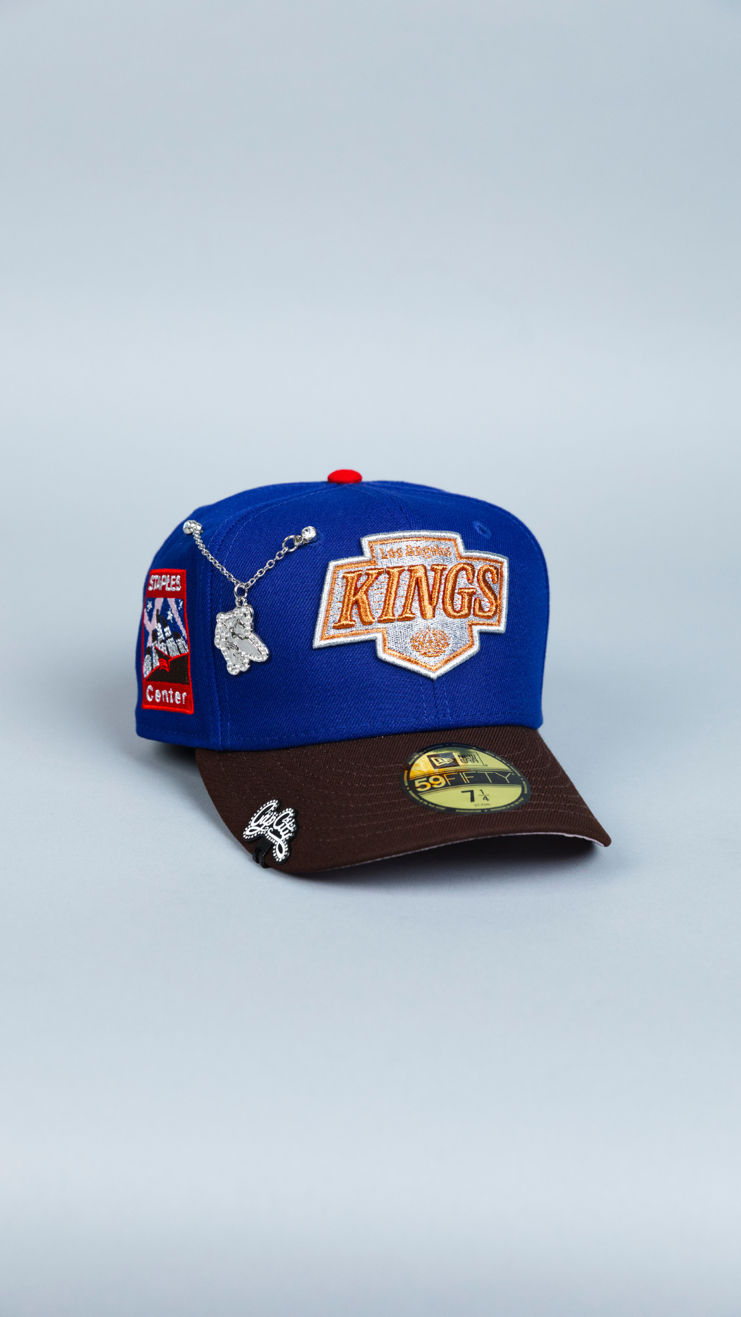 NEW ERA EXCLUSIVE 59FIFTY DARK BLUE/ BROWN LOS ANGELES KINGS W/ STAPLES CENTER SIDE PATCH