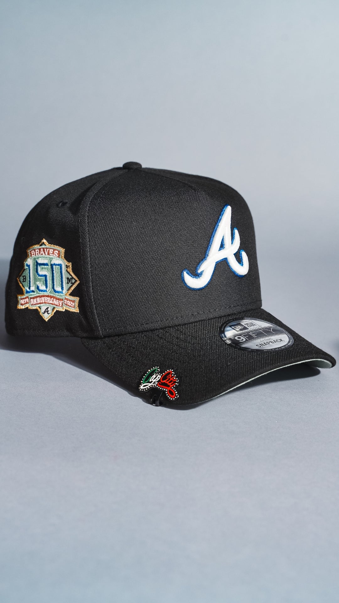 NEW ERA 9FIFTY A-FRAME BLACK ATLANTA BRAVES SNAPBACK W/ 150TH ANNIVERSARY SIDE PATCH