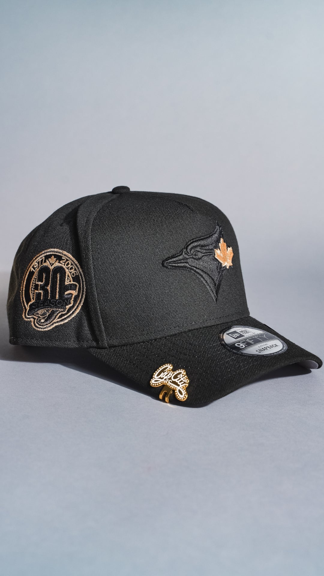 NEW ERA 9FIFTY A-FRAME BLACKED OUT TORONTO BLUE JAYS SNAPBACK W/ 30TH ANNIVERSARY SIDE PATCH