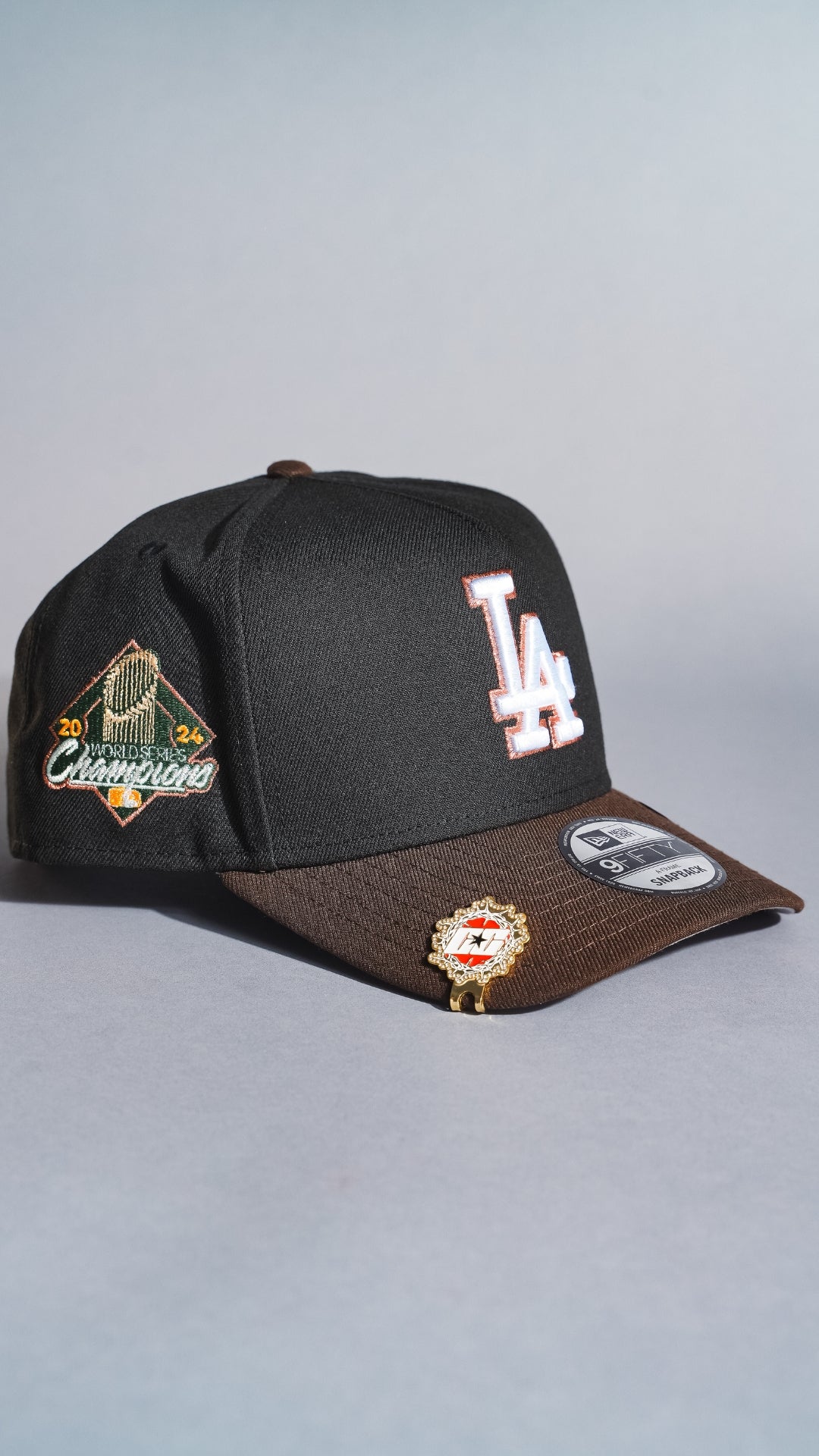NEW ERA 9FIFTY A-FRAME BLACK/BROWN LOS ANGELES DODGERS SNAPBACK W/ WORLD SERIES CHAMPIONS SIDE PATCH