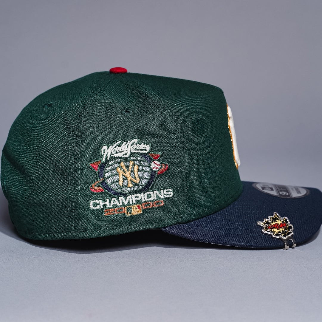 NEW ERA 9FIFTY A-FRAME FOREST GREEN/NAVY NEW YORK YANKEES SNAPBACK W/ WORLD SERIES CHAMPIONS SIDE PATCH