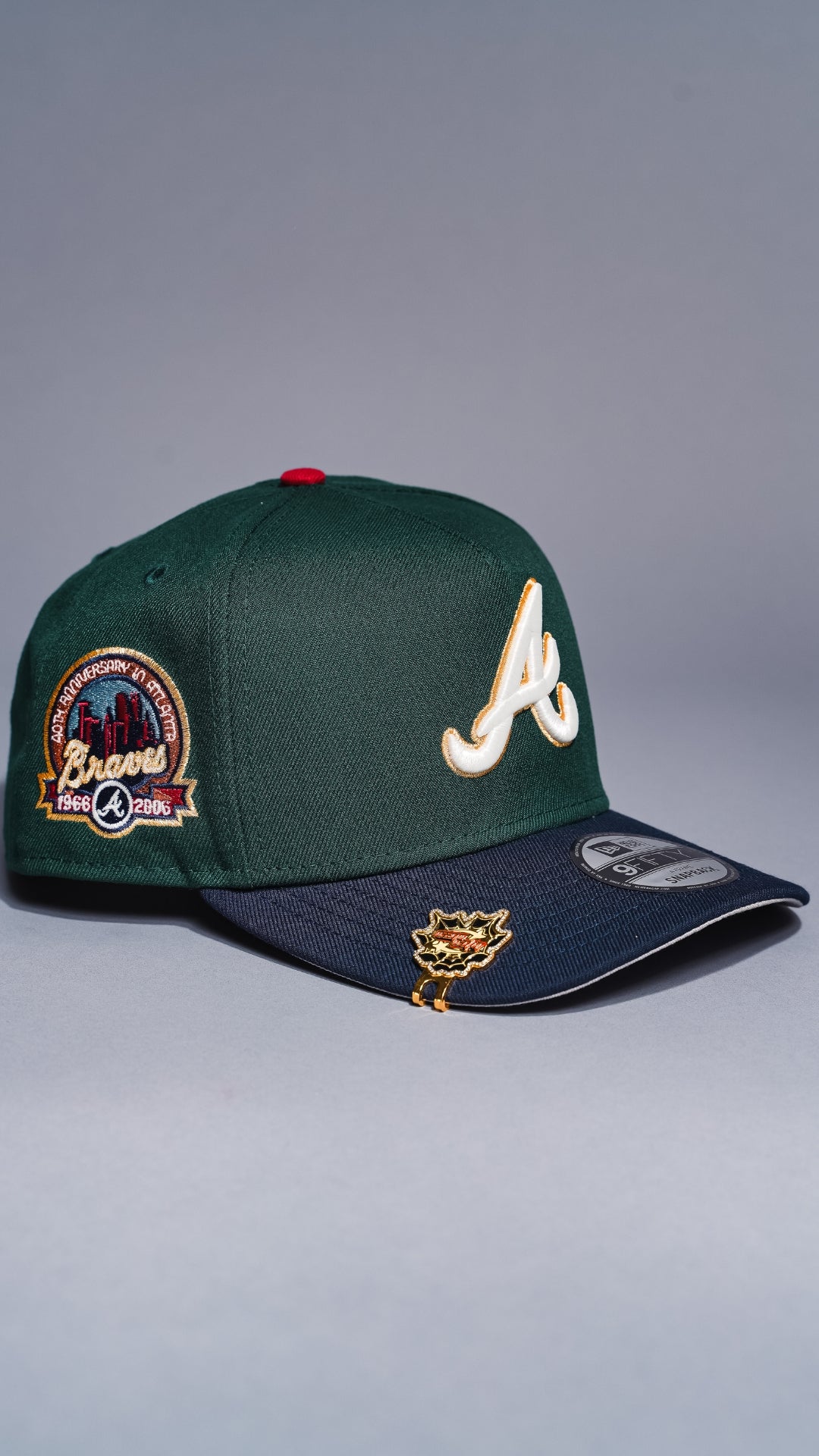 NEW ERA 9FIFTY A-FRAME FOREST GREEN/NAVY ATLANTA BRAVES SNAPBACK W/ ANNIVERSARY SIDE PATCH